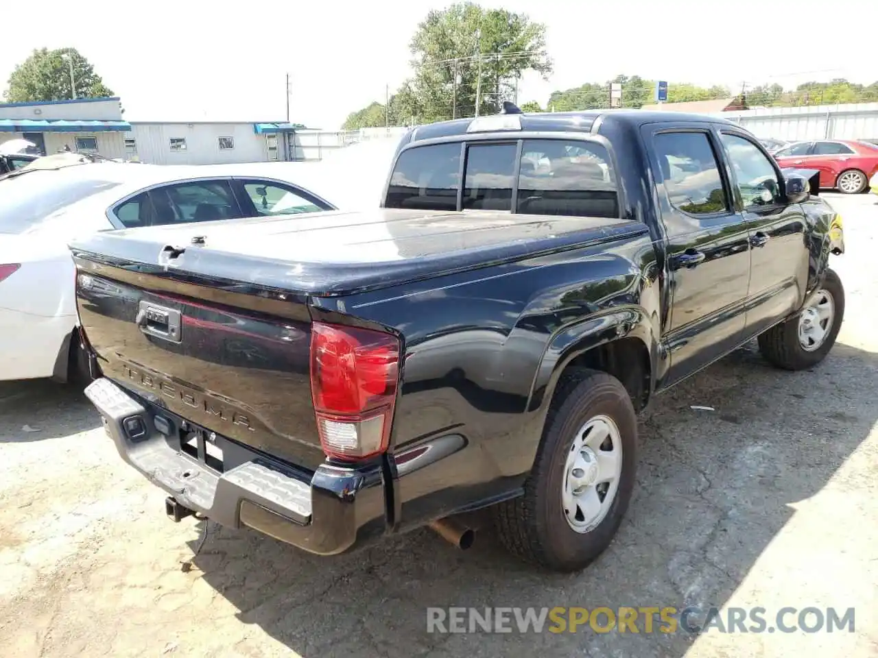 4 Photograph of a damaged car 5TFAX5GNXKX142106 TOYOTA TACOMA 2019