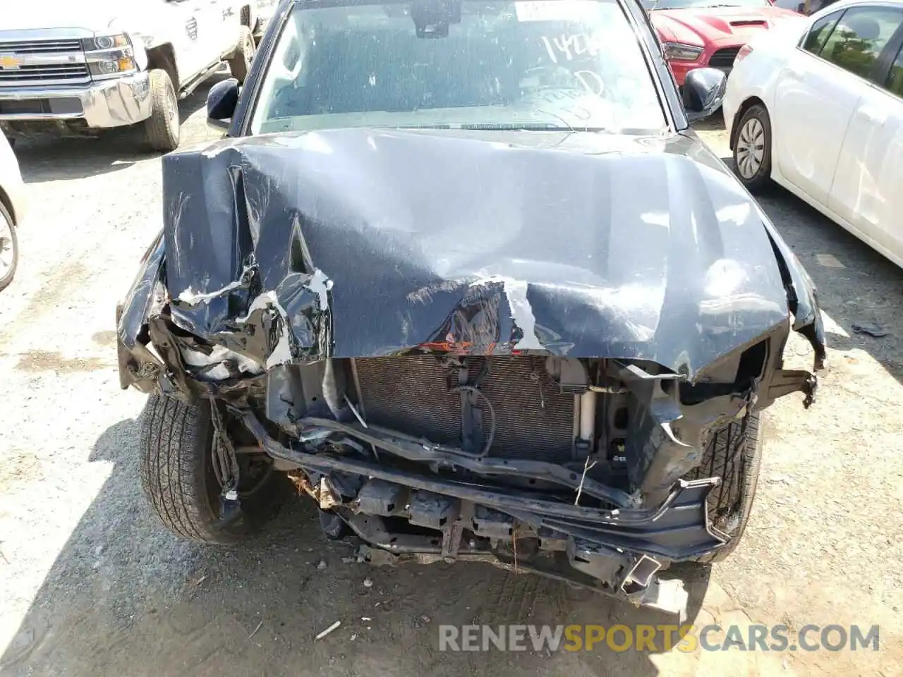 7 Photograph of a damaged car 5TFAX5GNXKX142106 TOYOTA TACOMA 2019