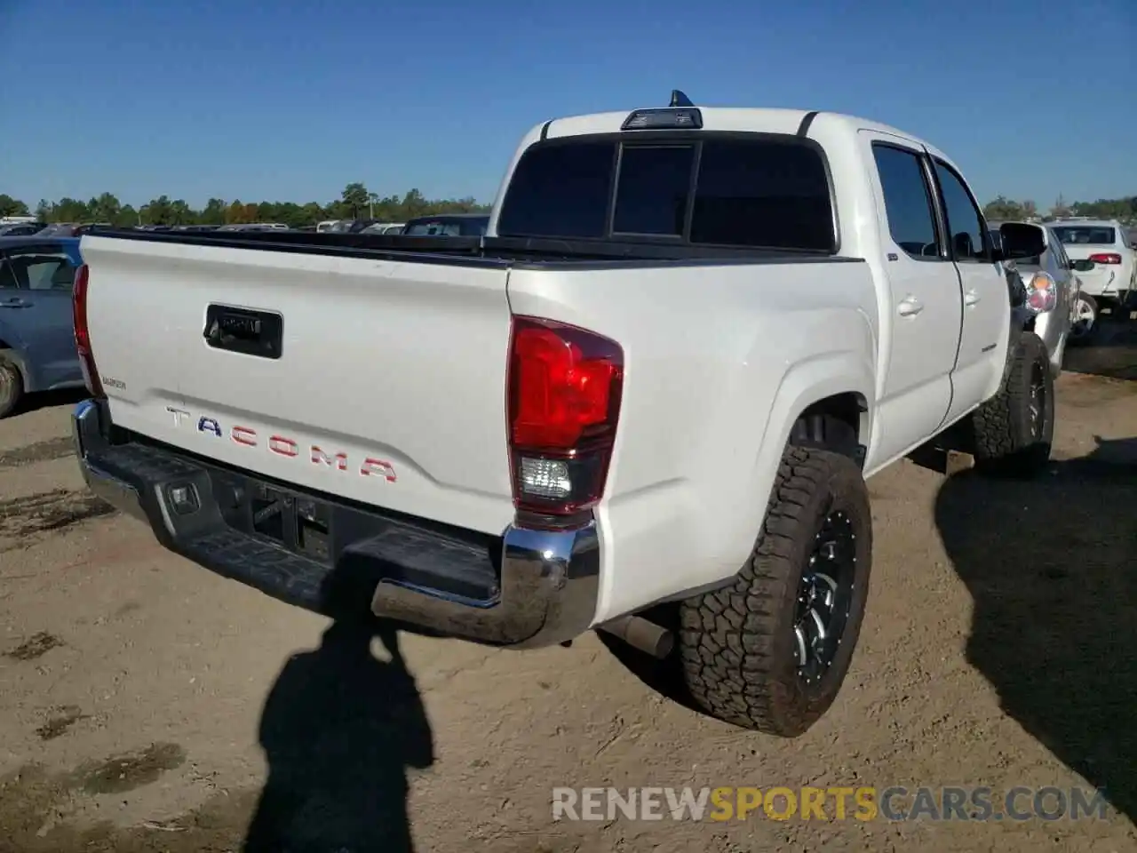 4 Photograph of a damaged car 5TFAX5GNXKX142803 TOYOTA TACOMA 2019