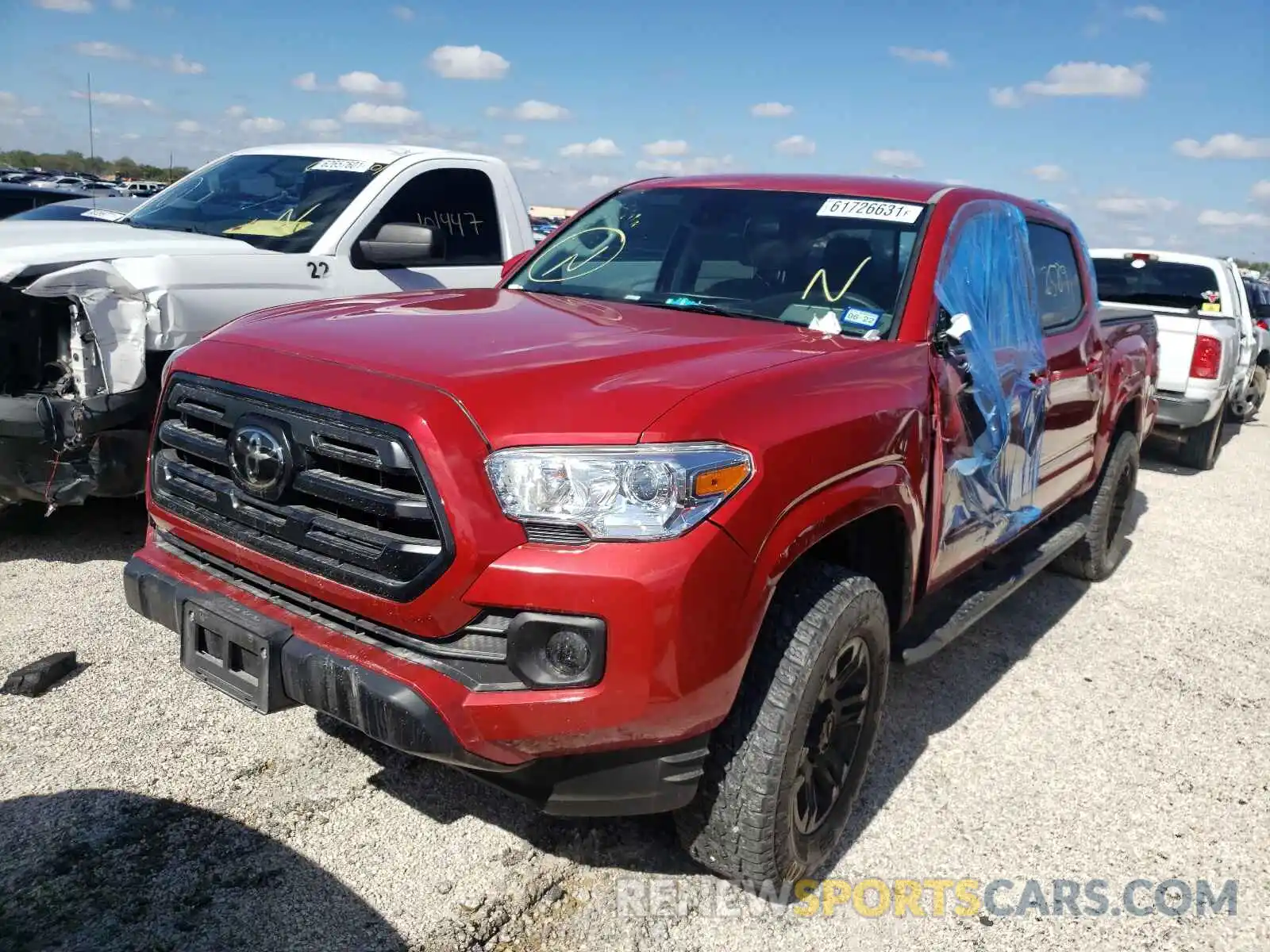 2 Photograph of a damaged car 5TFAX5GNXKX146754 TOYOTA TACOMA 2019