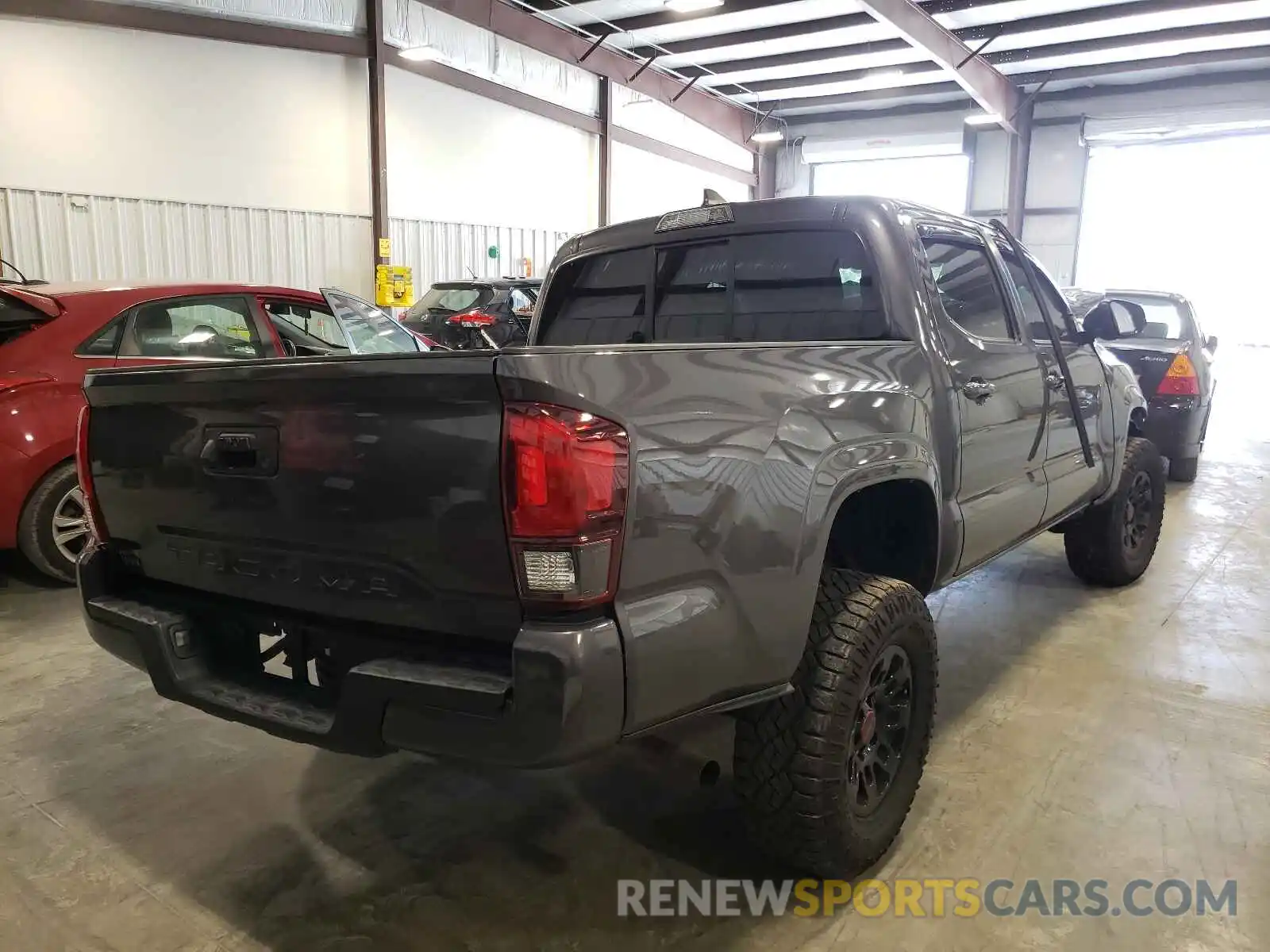 4 Photograph of a damaged car 5TFAX5GNXKX146835 TOYOTA TACOMA 2019