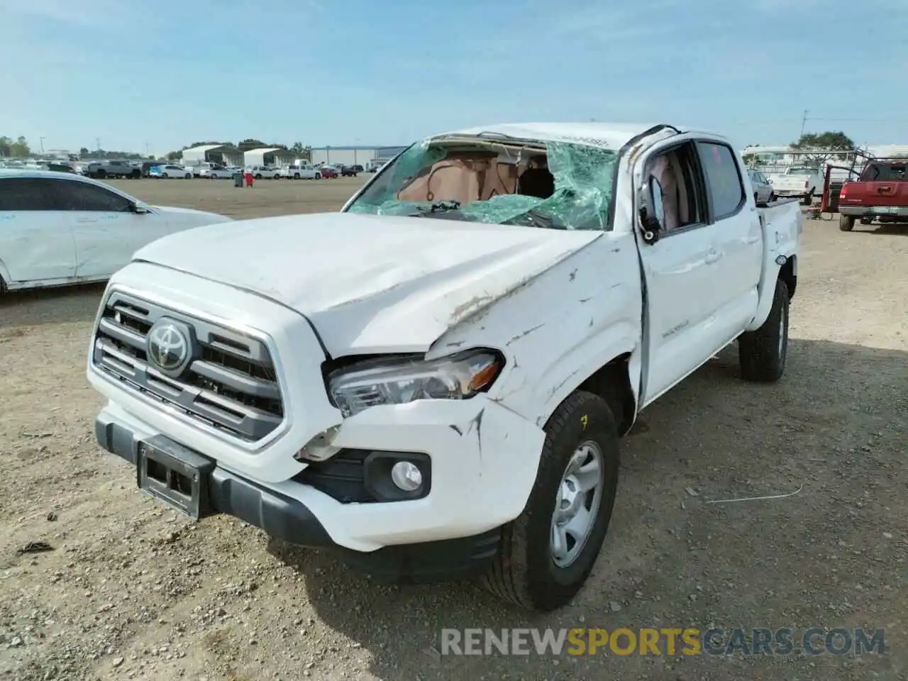 2 Photograph of a damaged car 5TFAX5GNXKX146897 TOYOTA TACOMA 2019