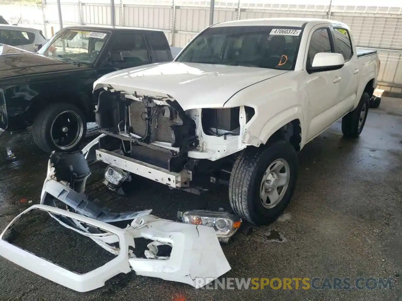 2 Photograph of a damaged car 5TFAX5GNXKX148309 TOYOTA TACOMA 2019