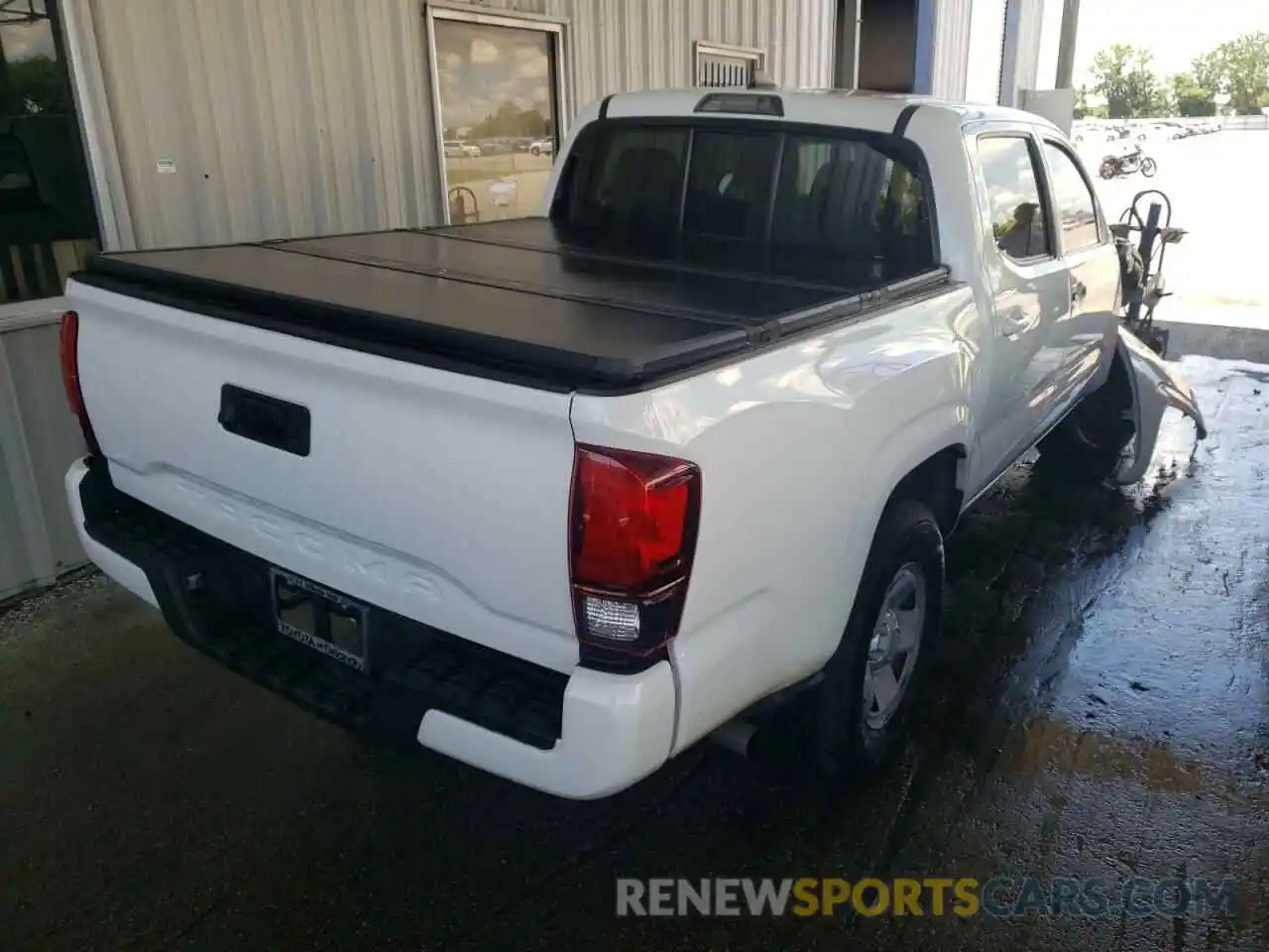 4 Photograph of a damaged car 5TFAX5GNXKX148309 TOYOTA TACOMA 2019