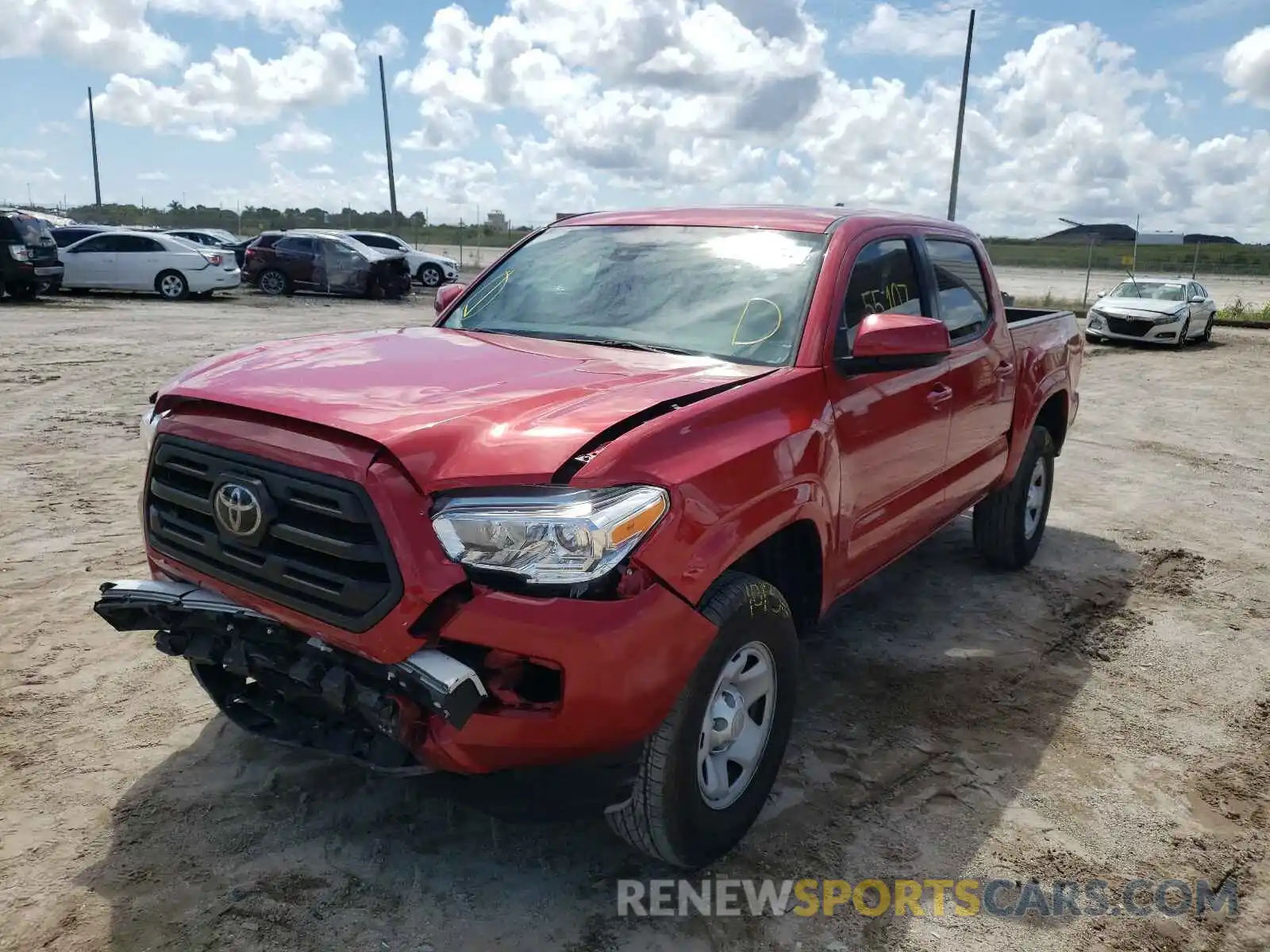 2 Photograph of a damaged car 5TFAX5GNXKX149122 TOYOTA TACOMA 2019