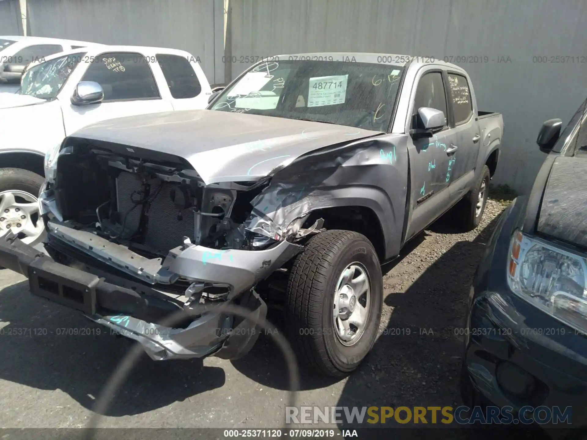 2 Photograph of a damaged car 5TFAX5GNXKX149573 TOYOTA TACOMA 2019