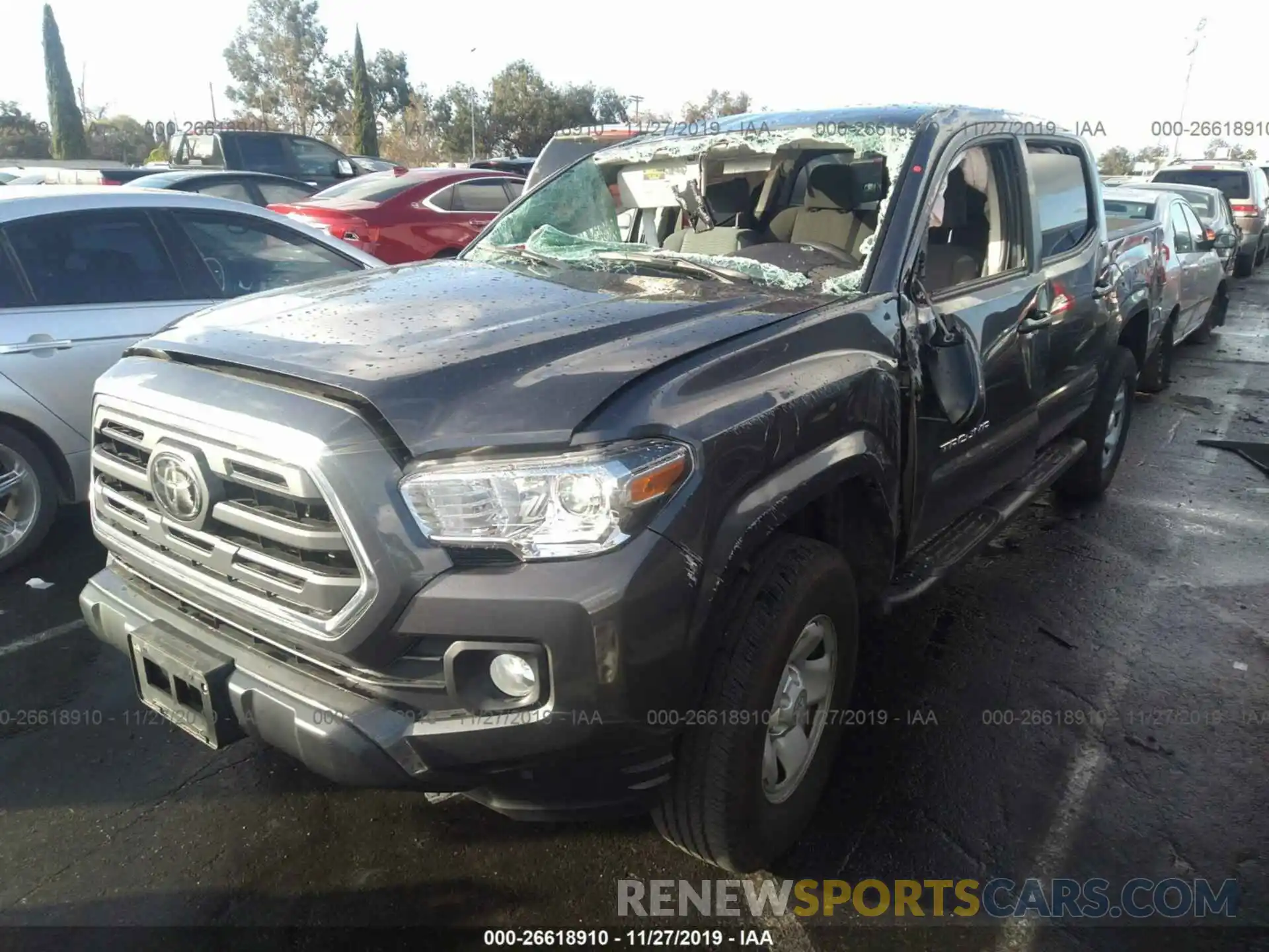 2 Photograph of a damaged car 5TFAX5GNXKX150724 TOYOTA TACOMA 2019