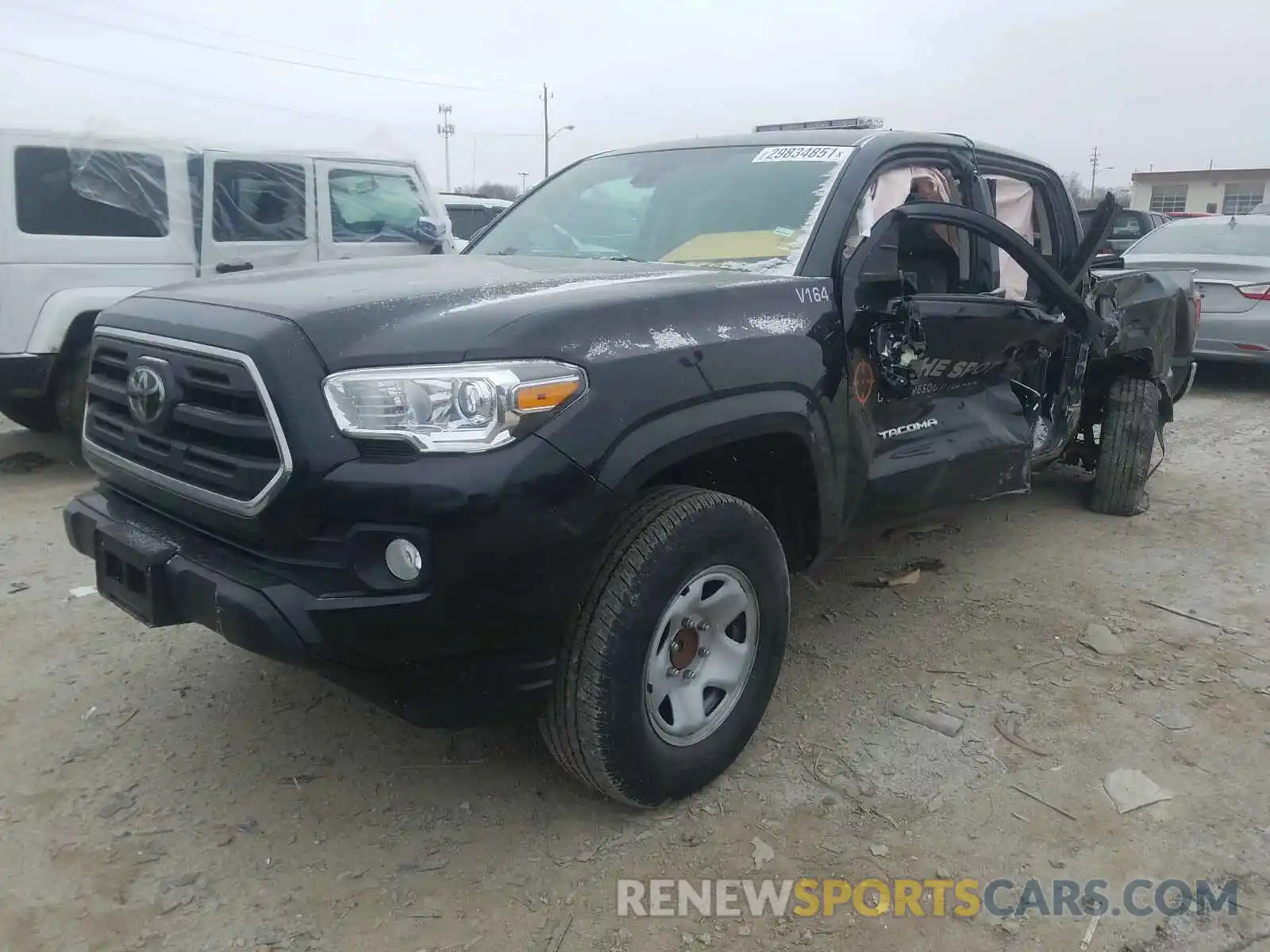 2 Photograph of a damaged car 5TFAX5GNXKX153901 TOYOTA TACOMA 2019