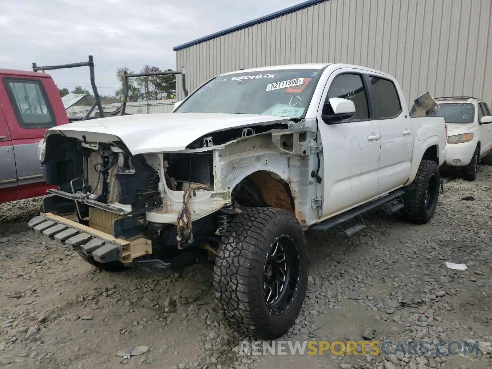 2 Photograph of a damaged car 5TFAX5GNXKX155129 TOYOTA TACOMA 2019