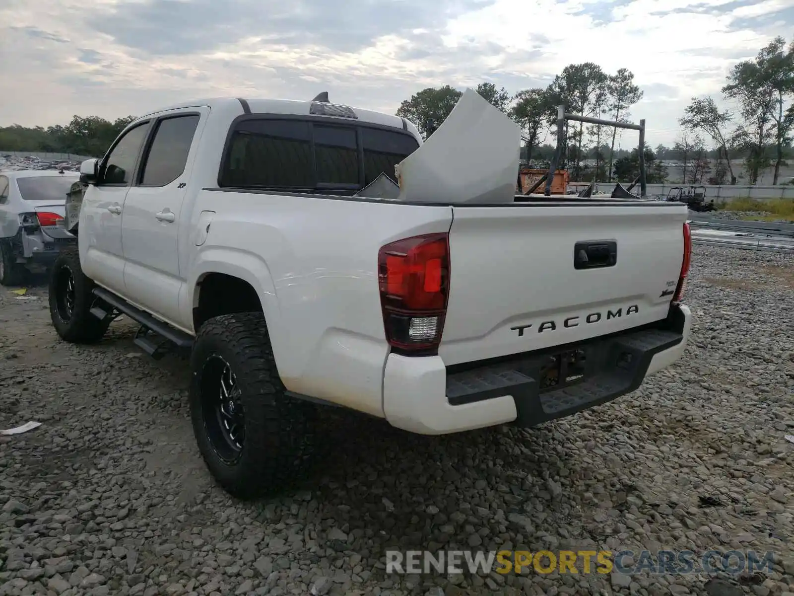 3 Photograph of a damaged car 5TFAX5GNXKX155129 TOYOTA TACOMA 2019