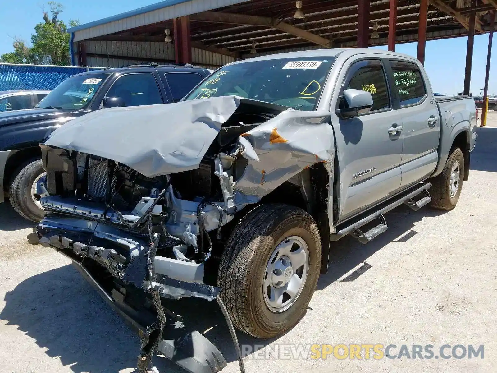 2 Photograph of a damaged car 5TFAX5GNXKX155762 TOYOTA TACOMA 2019