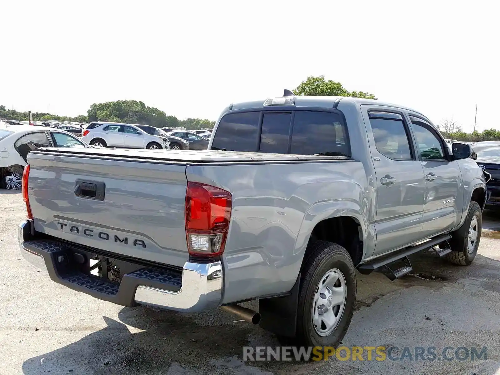 4 Photograph of a damaged car 5TFAX5GNXKX155762 TOYOTA TACOMA 2019