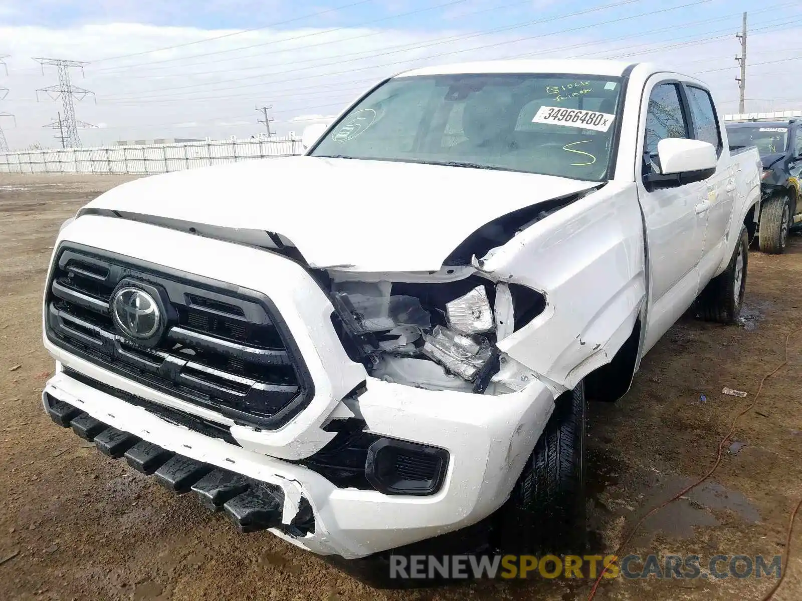 2 Photograph of a damaged car 5TFAX5GNXKX157494 TOYOTA TACOMA 2019