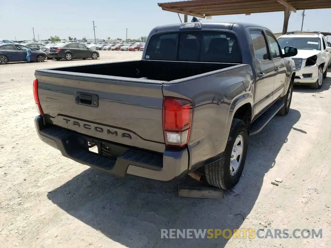 4 Photograph of a damaged car 5TFAX5GNXKX157852 TOYOTA TACOMA 2019