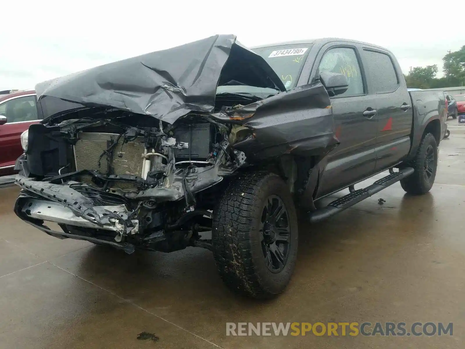 2 Photograph of a damaged car 5TFAX5GNXKX164400 TOYOTA TACOMA 2019