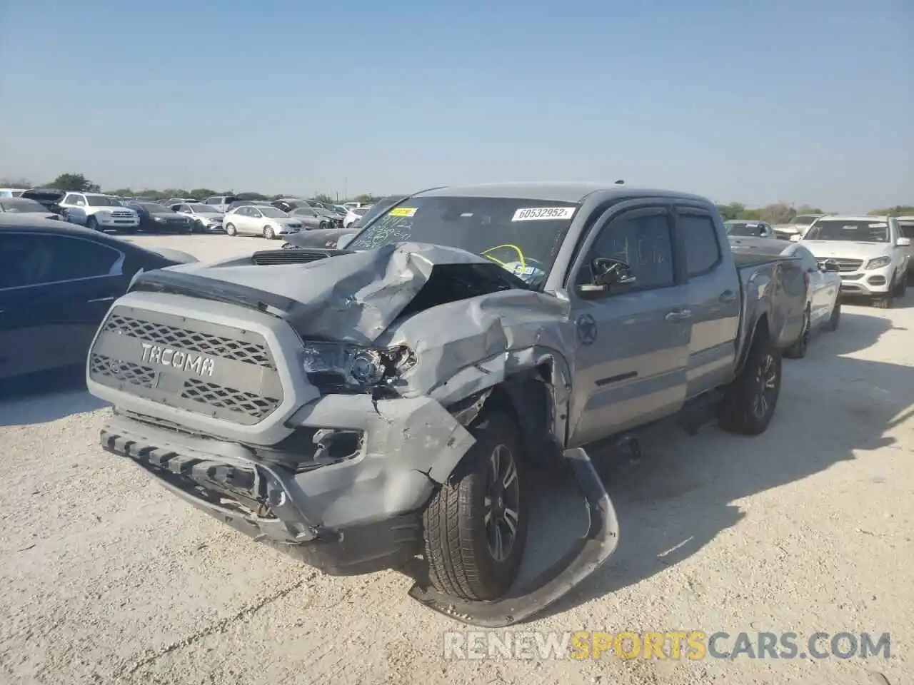 2 Photograph of a damaged car 5TFAZ5CN0KX075631 TOYOTA TACOMA 2019