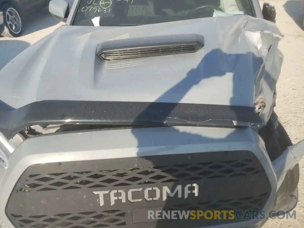 7 Photograph of a damaged car 5TFAZ5CN0KX075631 TOYOTA TACOMA 2019