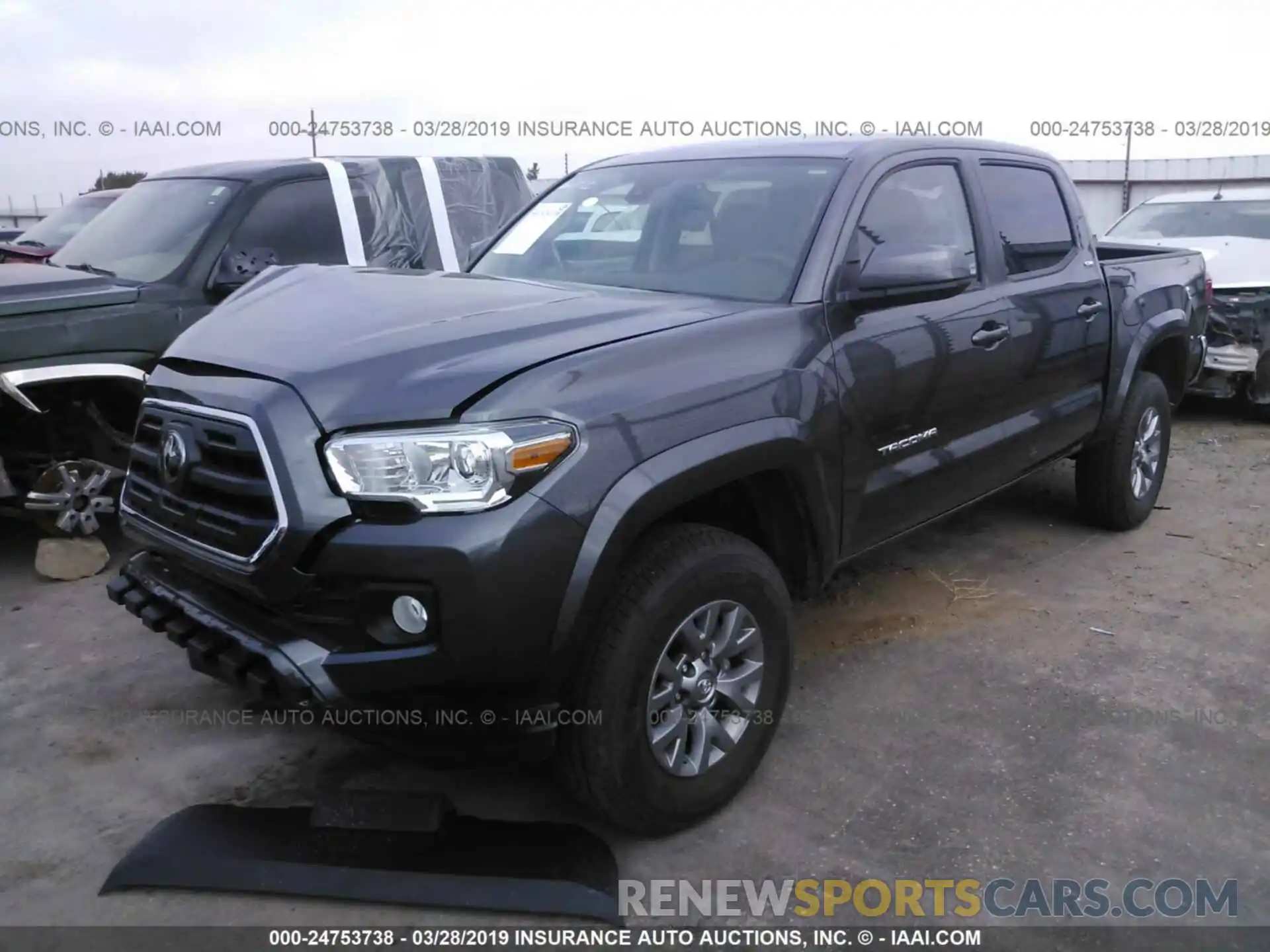 2 Photograph of a damaged car 5TFAZ5CN0KX079386 TOYOTA TACOMA 2019