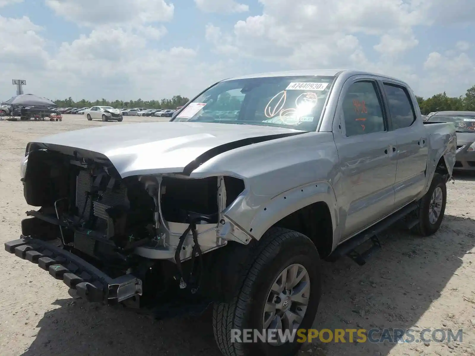 2 Photograph of a damaged car 5TFAZ5CN0KX084913 TOYOTA TACOMA 2019