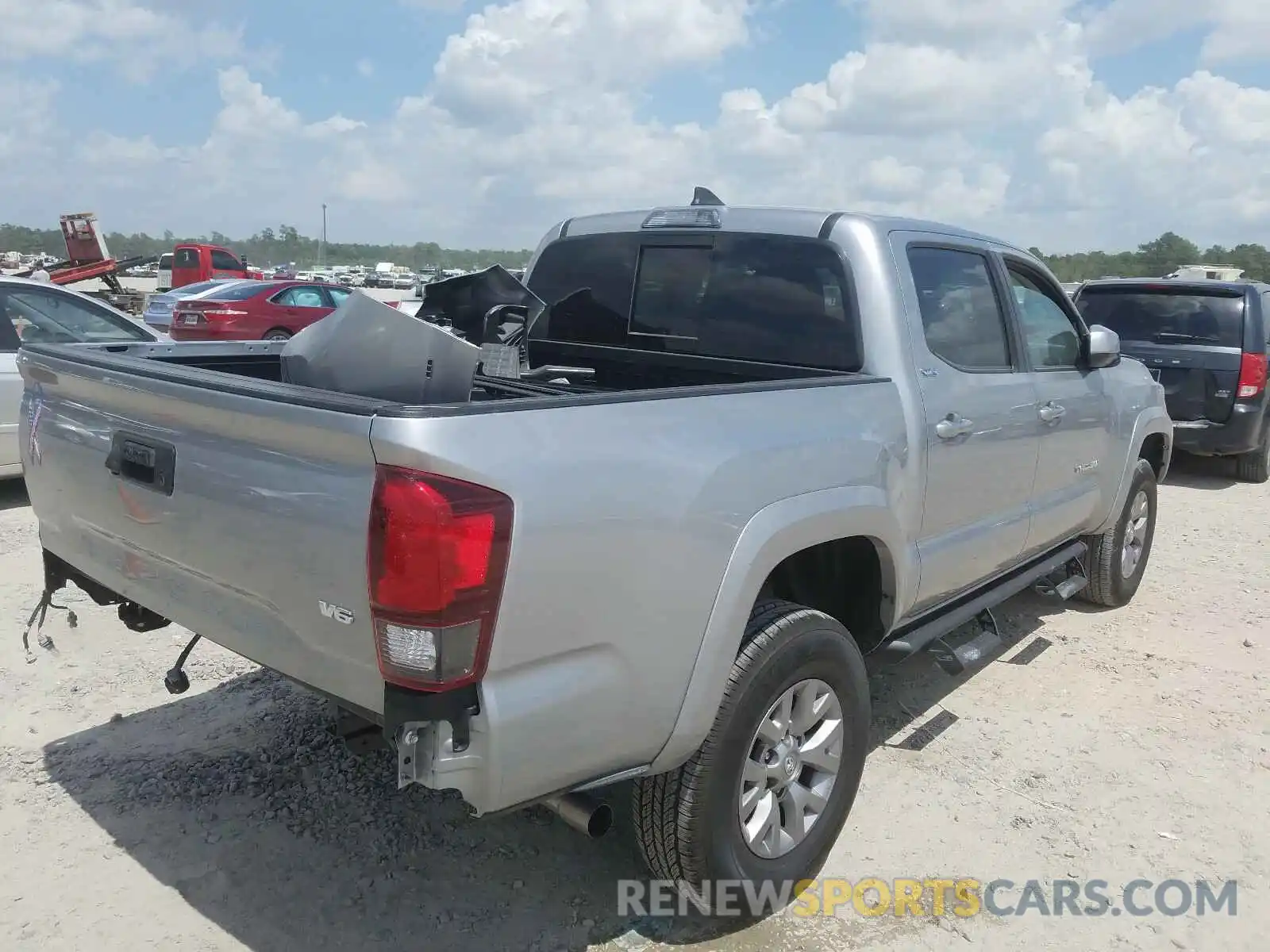 4 Photograph of a damaged car 5TFAZ5CN0KX084913 TOYOTA TACOMA 2019