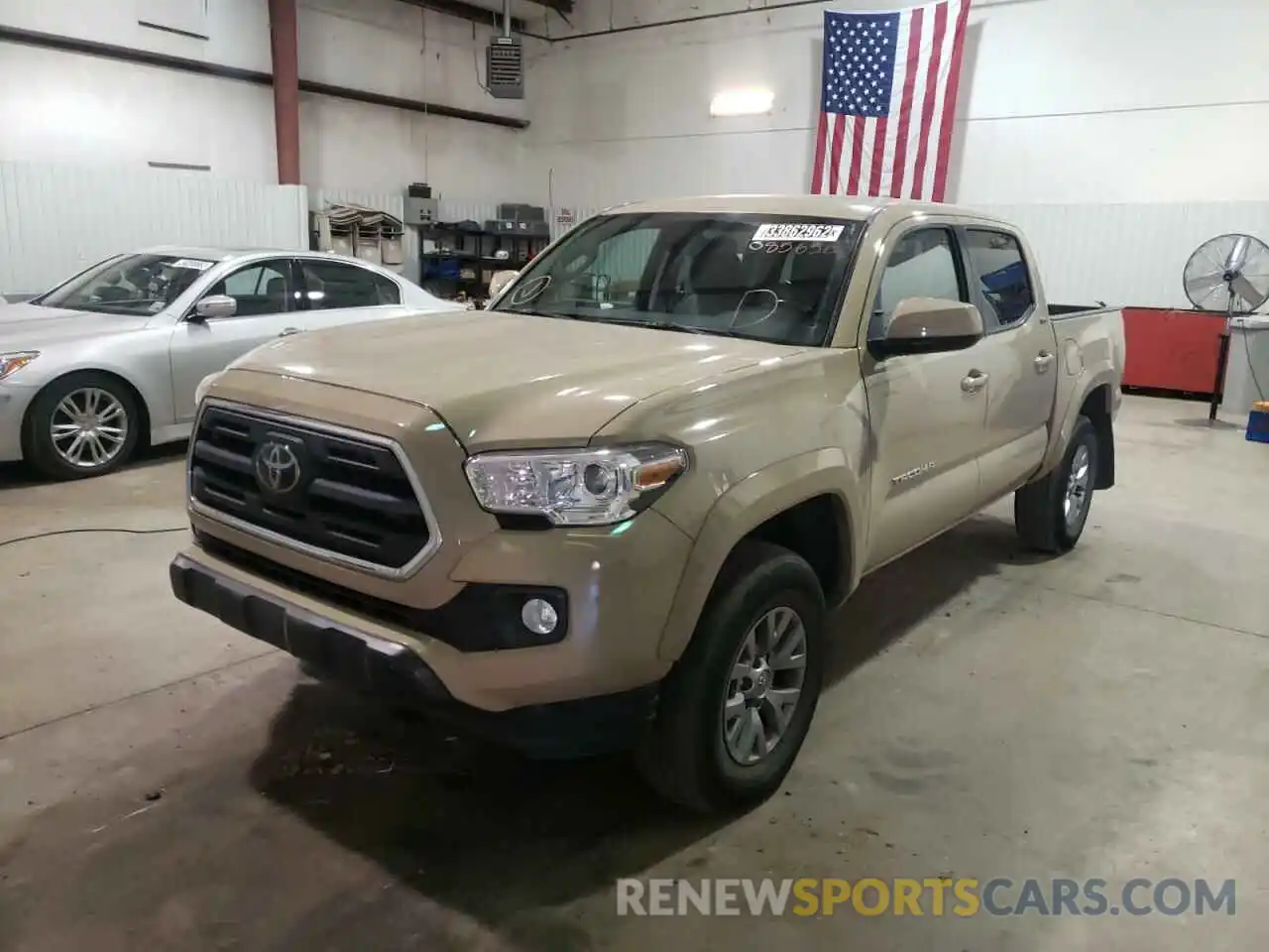 2 Photograph of a damaged car 5TFAZ5CN0KX085656 TOYOTA TACOMA 2019