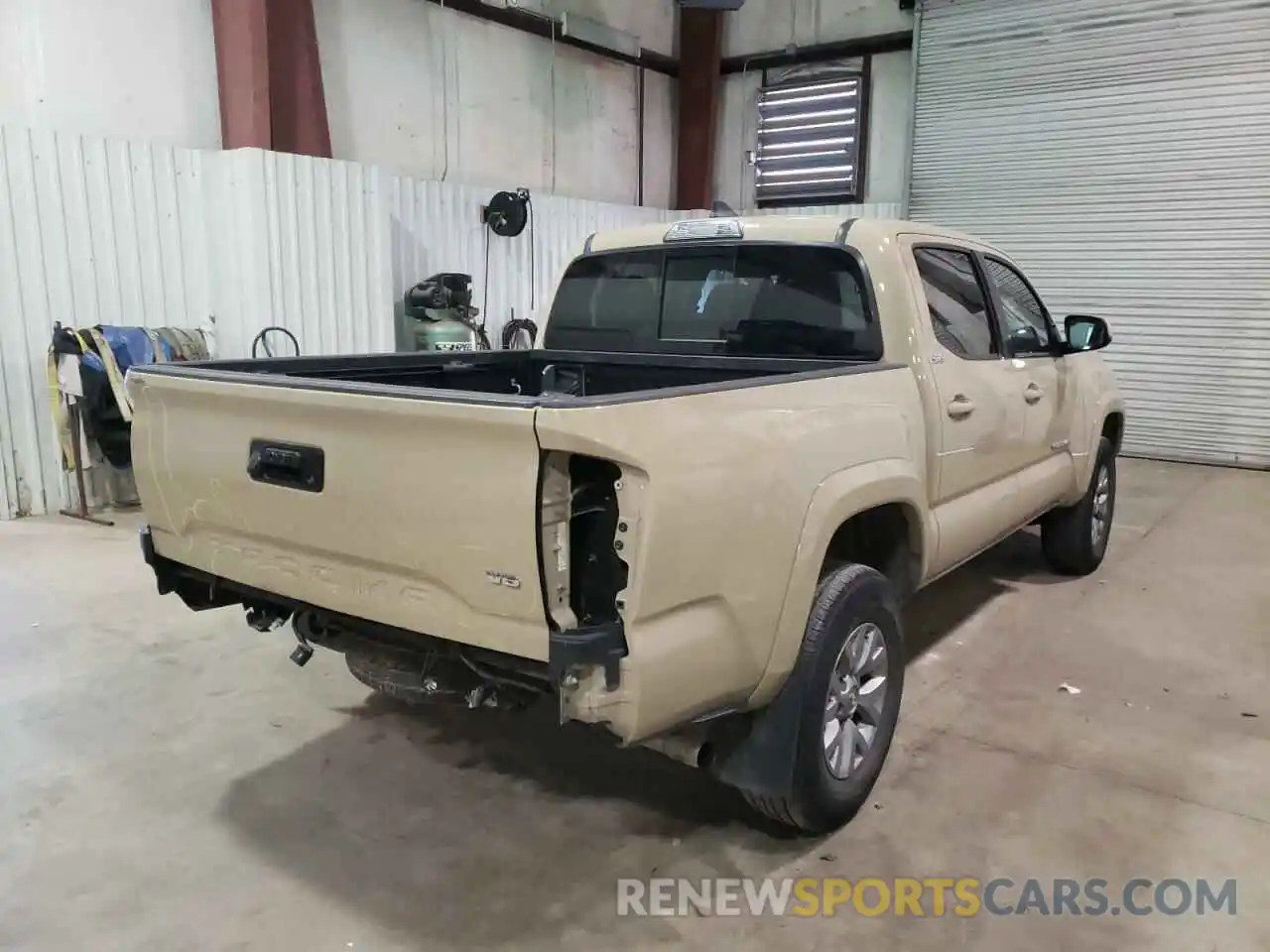 4 Photograph of a damaged car 5TFAZ5CN0KX085656 TOYOTA TACOMA 2019