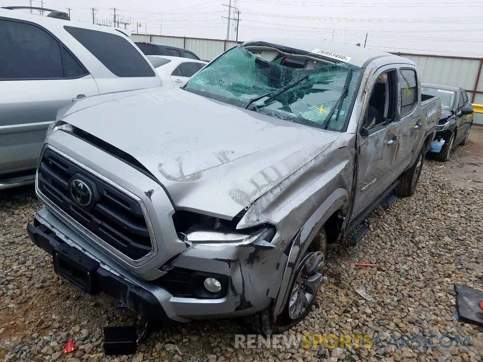 2 Photograph of a damaged car 5TFAZ5CN0KX085981 TOYOTA TACOMA 2019