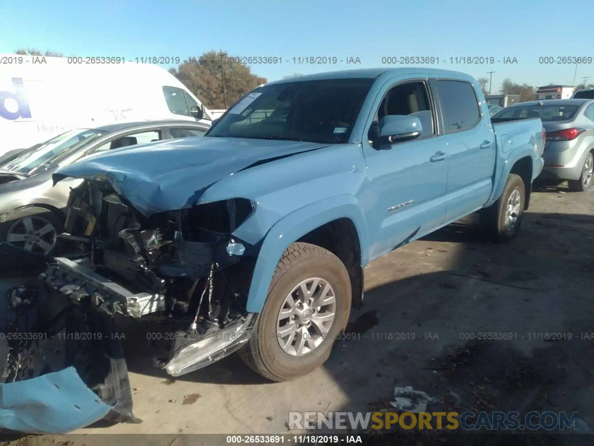 2 Photograph of a damaged car 5TFAZ5CN0KX086550 TOYOTA TACOMA 2019