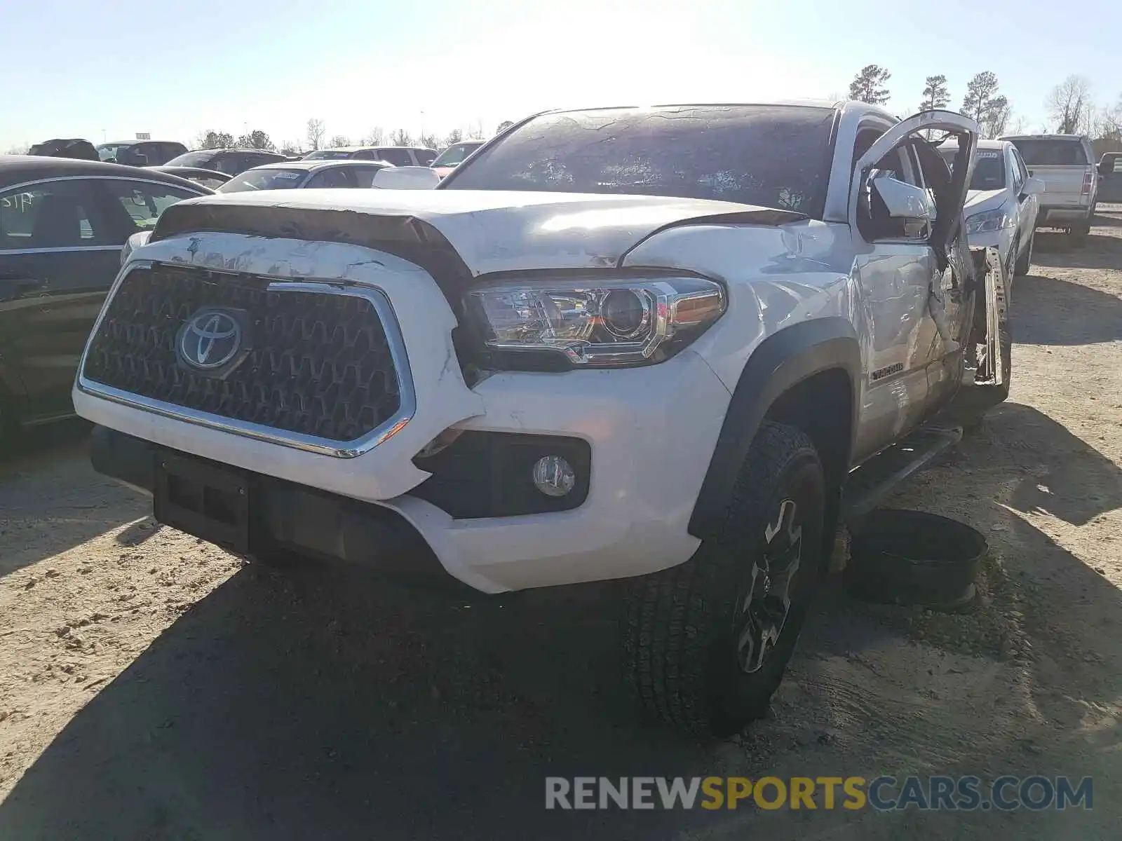 2 Photograph of a damaged car 5TFAZ5CN0KX086936 TOYOTA TACOMA 2019