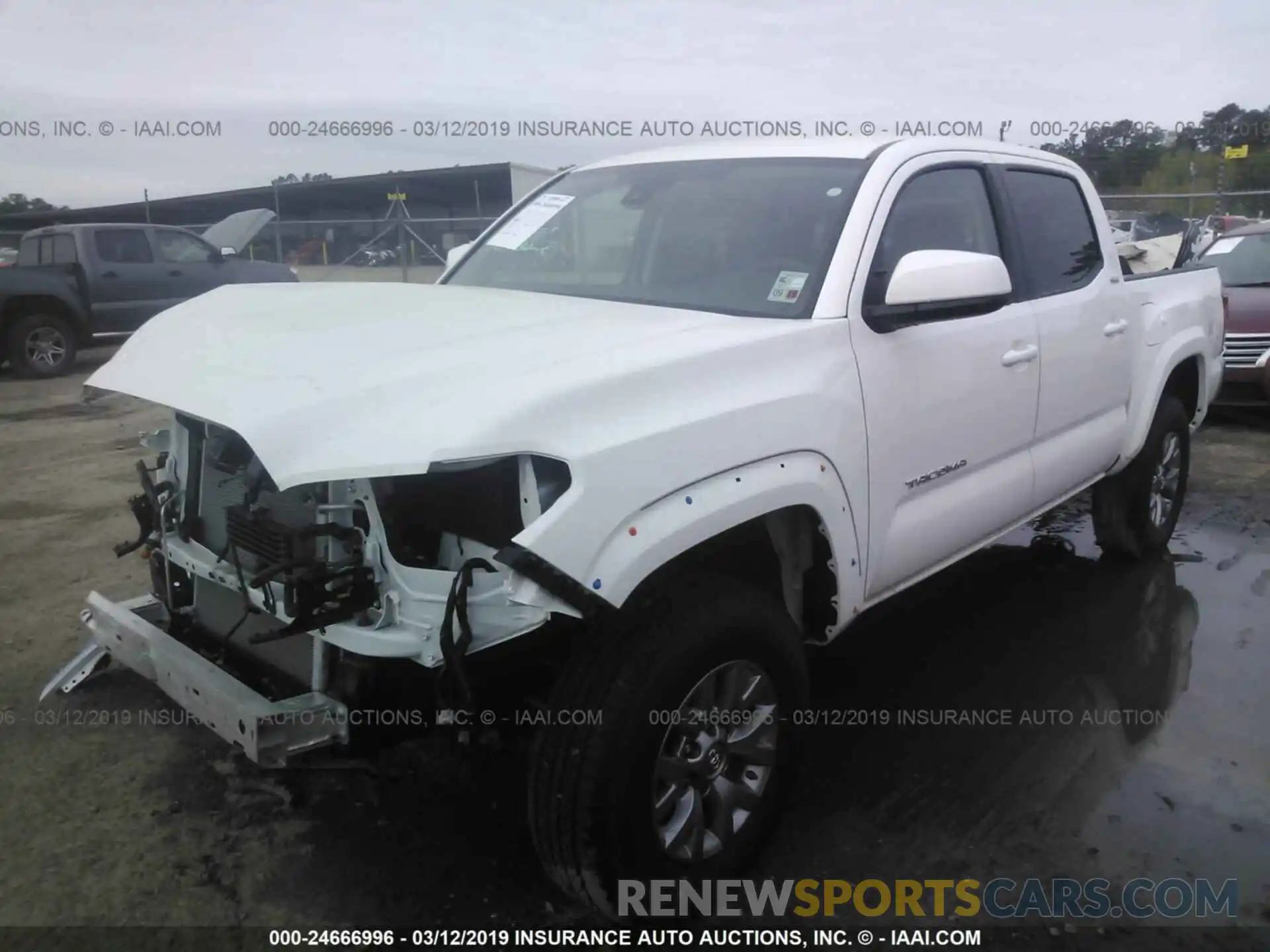 2 Photograph of a damaged car 5TFAZ5CN1KX071653 TOYOTA TACOMA 2019