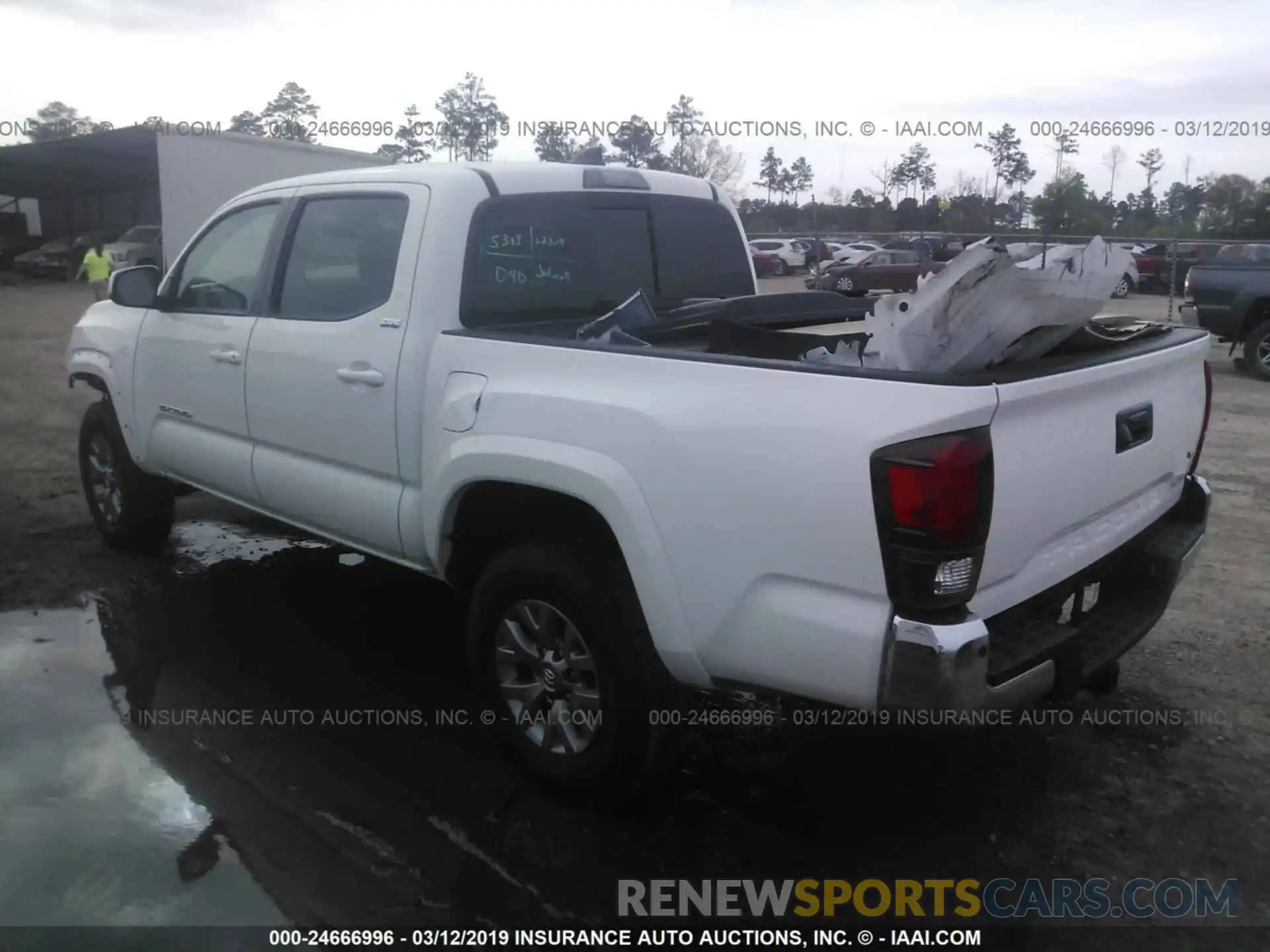 3 Photograph of a damaged car 5TFAZ5CN1KX071653 TOYOTA TACOMA 2019