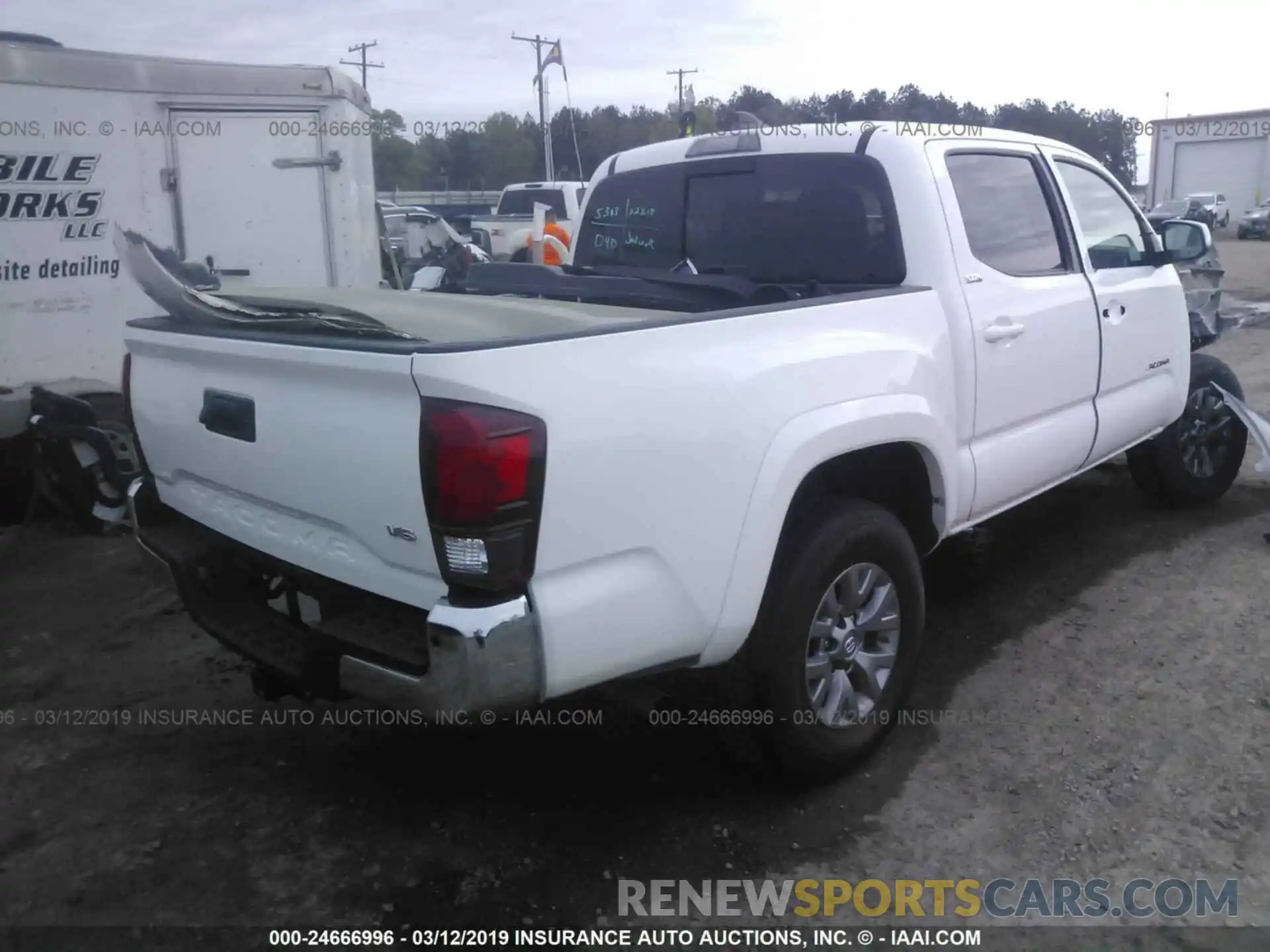 4 Photograph of a damaged car 5TFAZ5CN1KX071653 TOYOTA TACOMA 2019