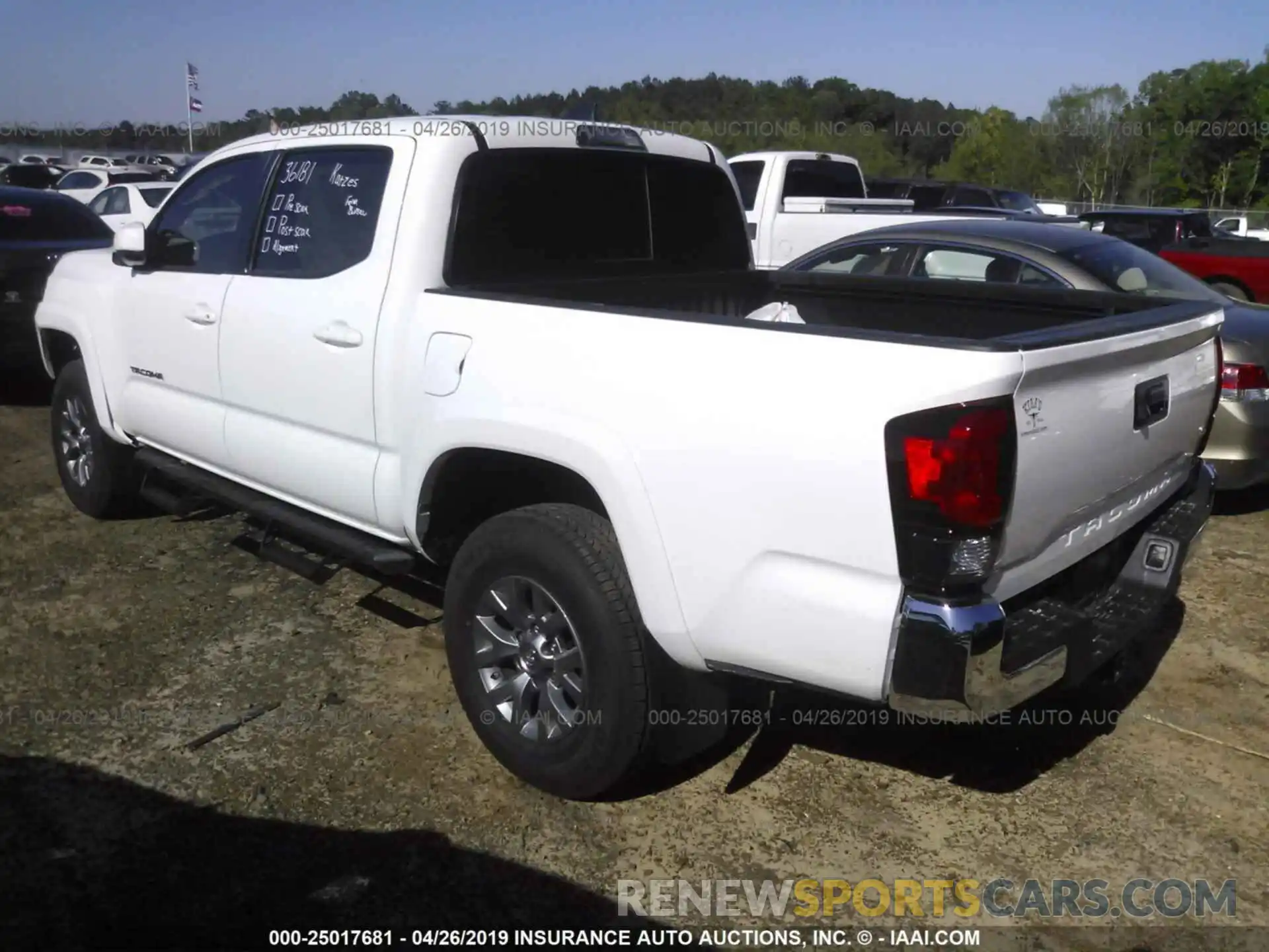 3 Photograph of a damaged car 5TFAZ5CN1KX074598 TOYOTA TACOMA 2019