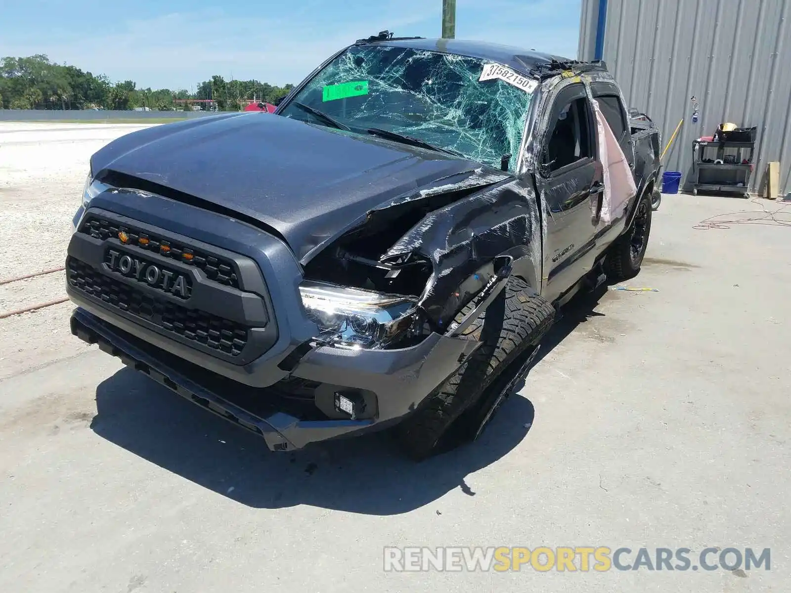 2 Photograph of a damaged car 5TFAZ5CN1KX075962 TOYOTA TACOMA 2019