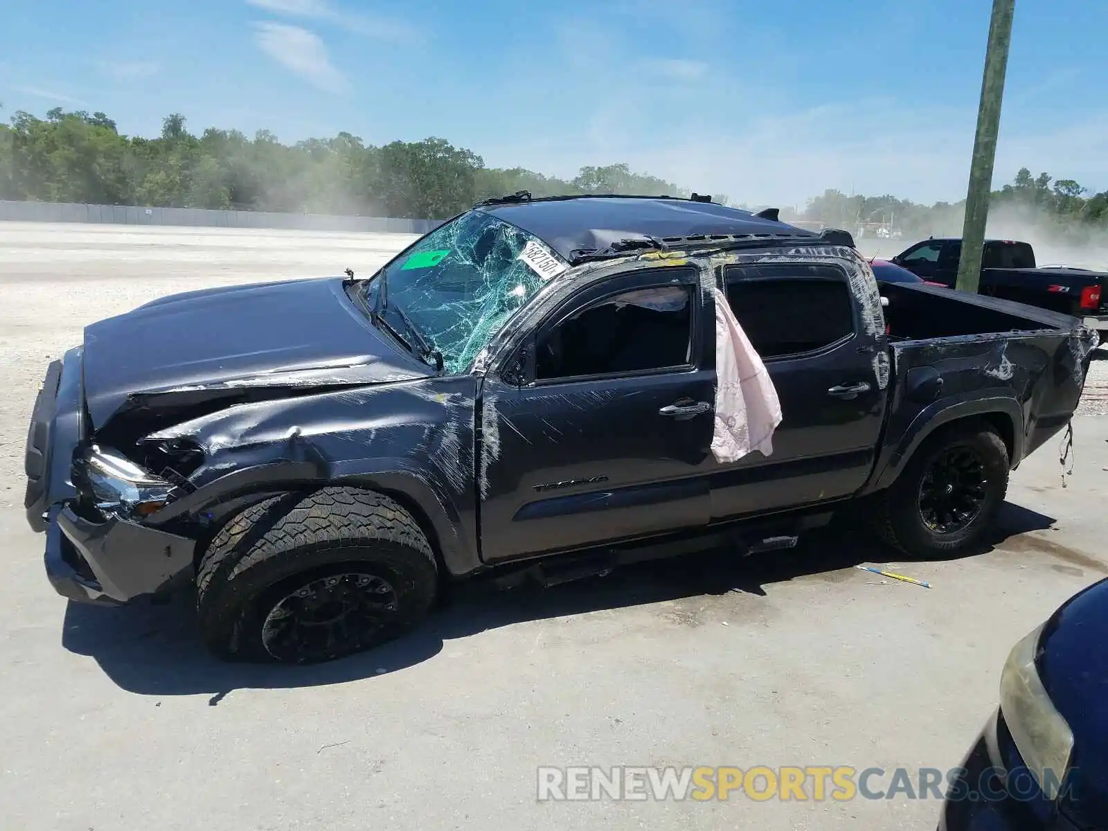 9 Photograph of a damaged car 5TFAZ5CN1KX075962 TOYOTA TACOMA 2019