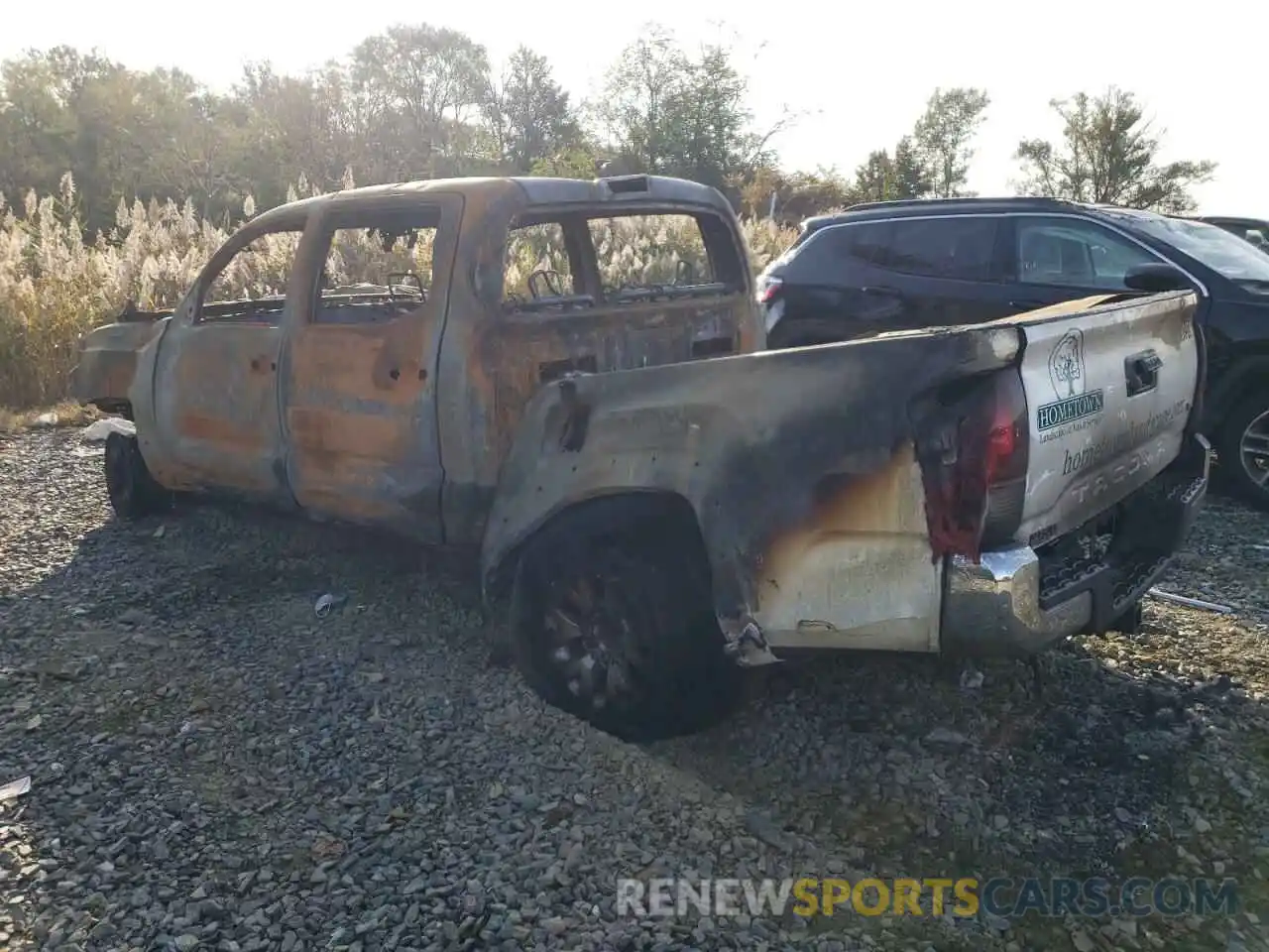 3 Photograph of a damaged car 5TFAZ5CN1KX076562 TOYOTA TACOMA 2019