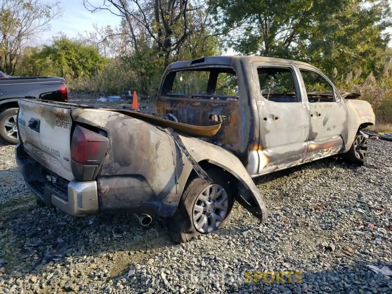 4 Photograph of a damaged car 5TFAZ5CN1KX076562 TOYOTA TACOMA 2019