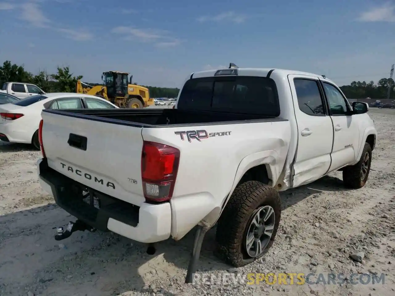 4 Photograph of a damaged car 5TFAZ5CN1KX077047 TOYOTA TACOMA 2019