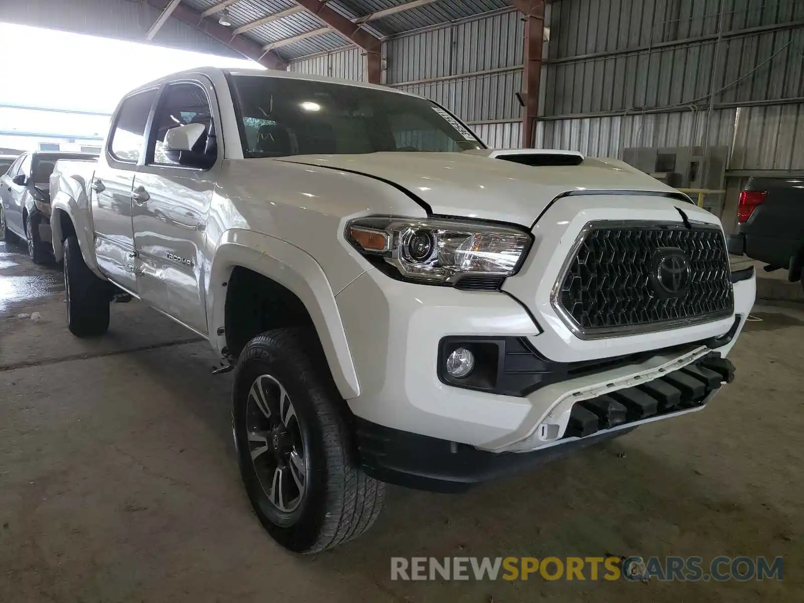 1 Photograph of a damaged car 5TFAZ5CN1KX077565 TOYOTA TACOMA 2019