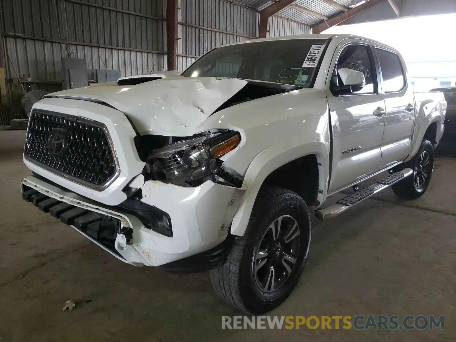 2 Photograph of a damaged car 5TFAZ5CN1KX077565 TOYOTA TACOMA 2019