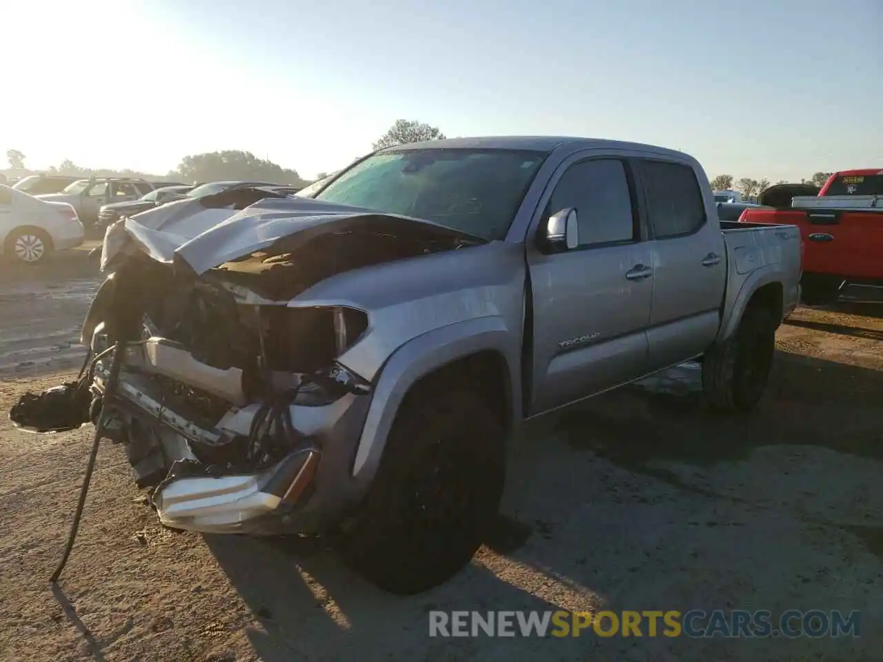 2 Photograph of a damaged car 5TFAZ5CN1KX077615 TOYOTA TACOMA 2019