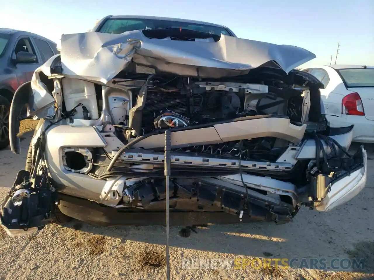 9 Photograph of a damaged car 5TFAZ5CN1KX077615 TOYOTA TACOMA 2019