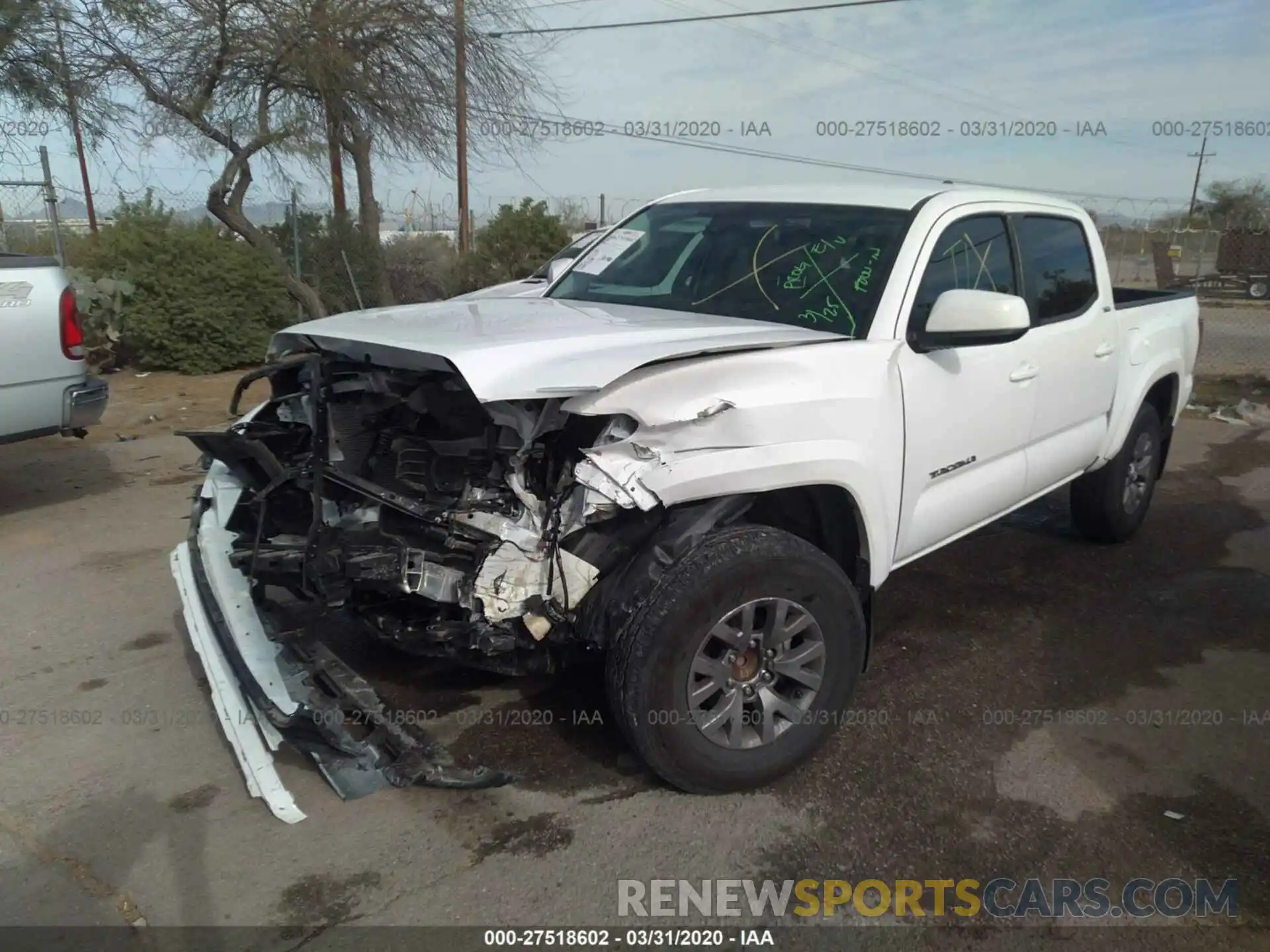 2 Photograph of a damaged car 5TFAZ5CN1KX079185 TOYOTA TACOMA 2019