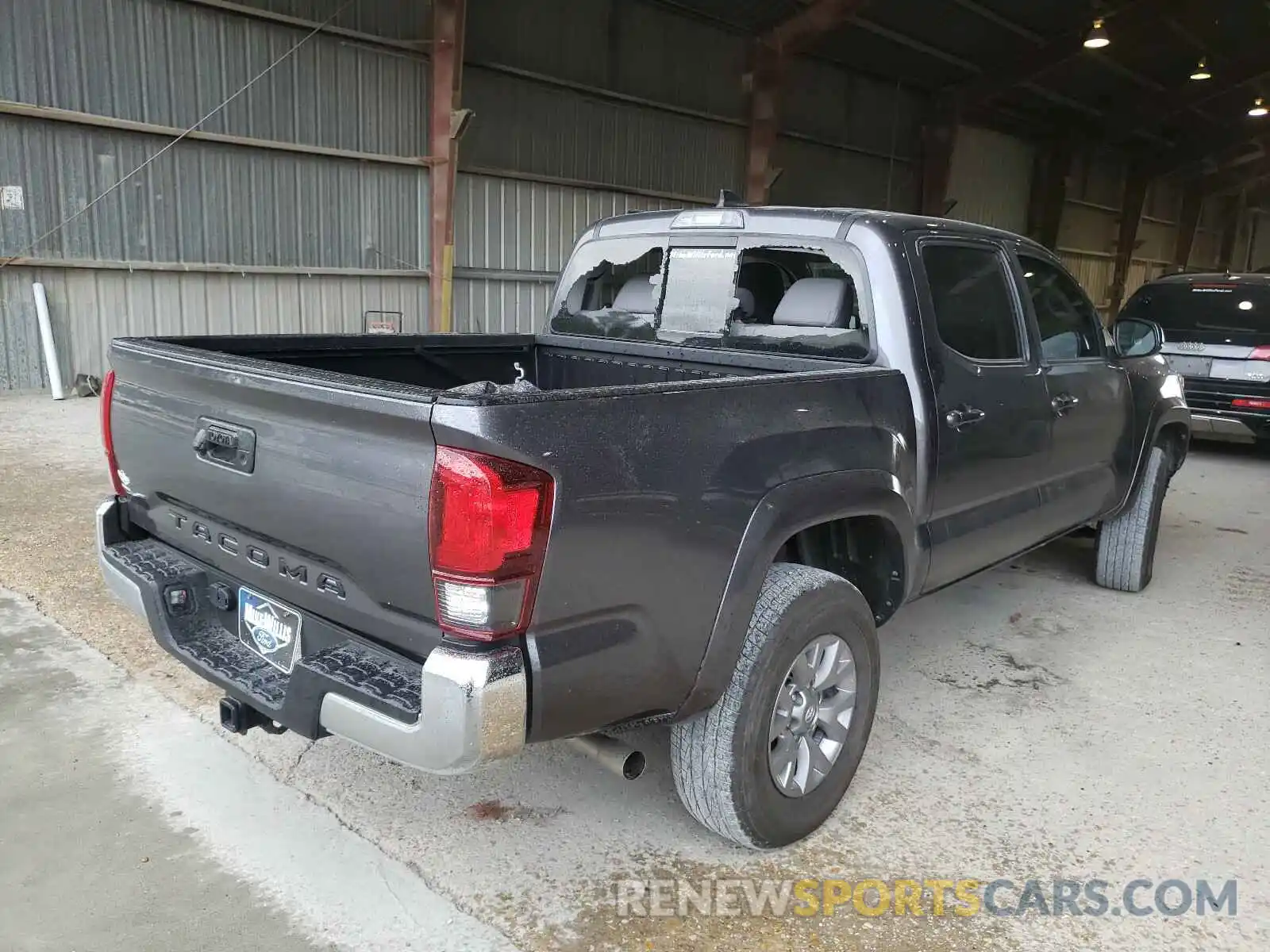 4 Photograph of a damaged car 5TFAZ5CN1KX079977 TOYOTA TACOMA 2019