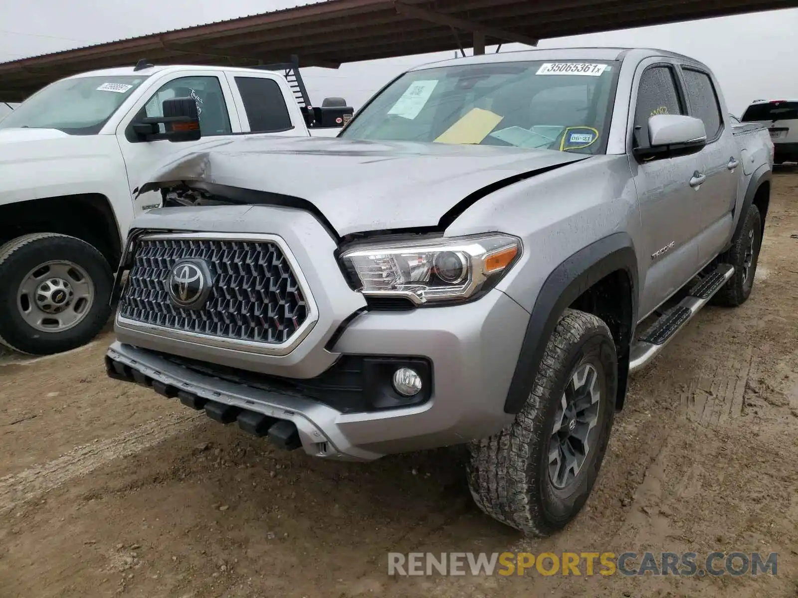 2 Photograph of a damaged car 5TFAZ5CN1KX082555 TOYOTA TACOMA 2019