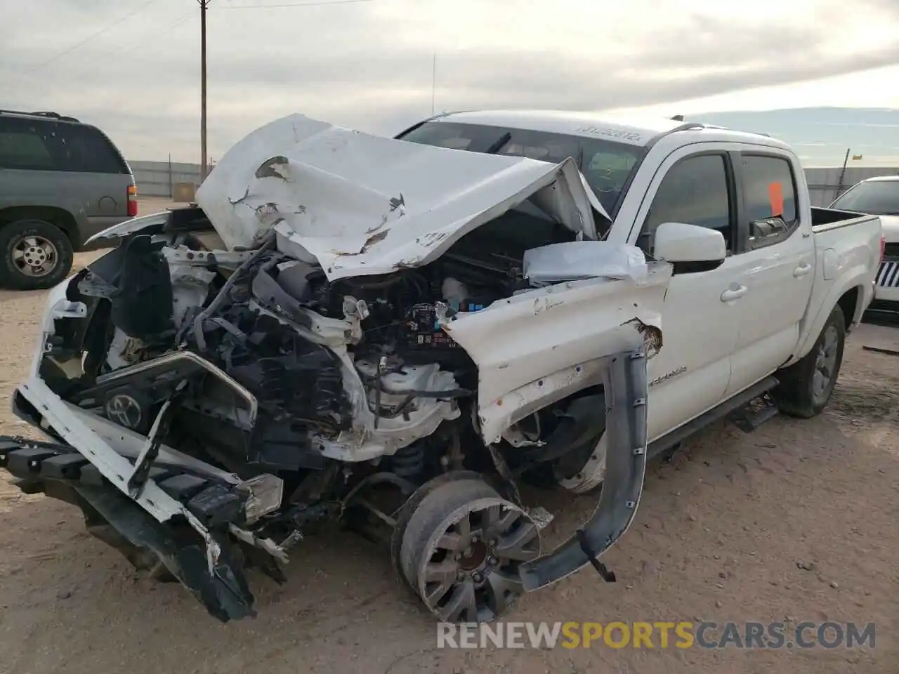 2 Photograph of a damaged car 5TFAZ5CN1KX083186 TOYOTA TACOMA 2019