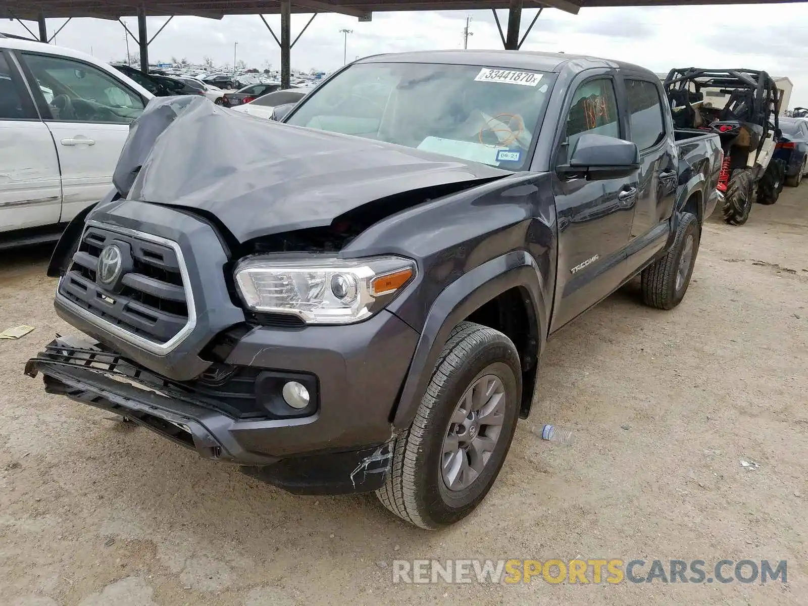 2 Photograph of a damaged car 5TFAZ5CN1KX084242 TOYOTA TACOMA 2019