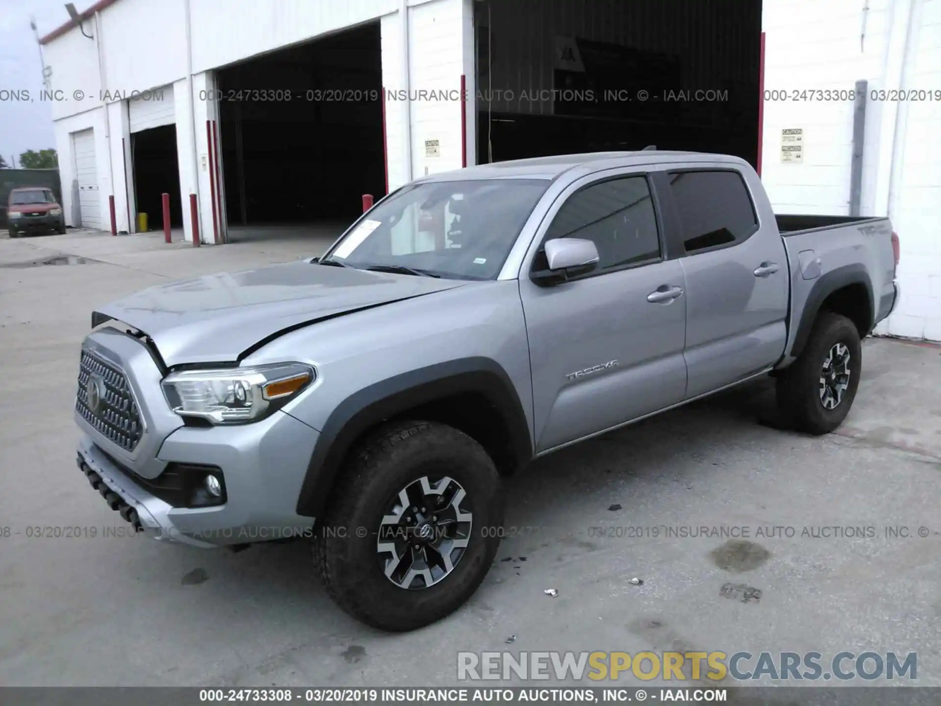 2 Photograph of a damaged car 5TFAZ5CN2KX072360 TOYOTA TACOMA 2019