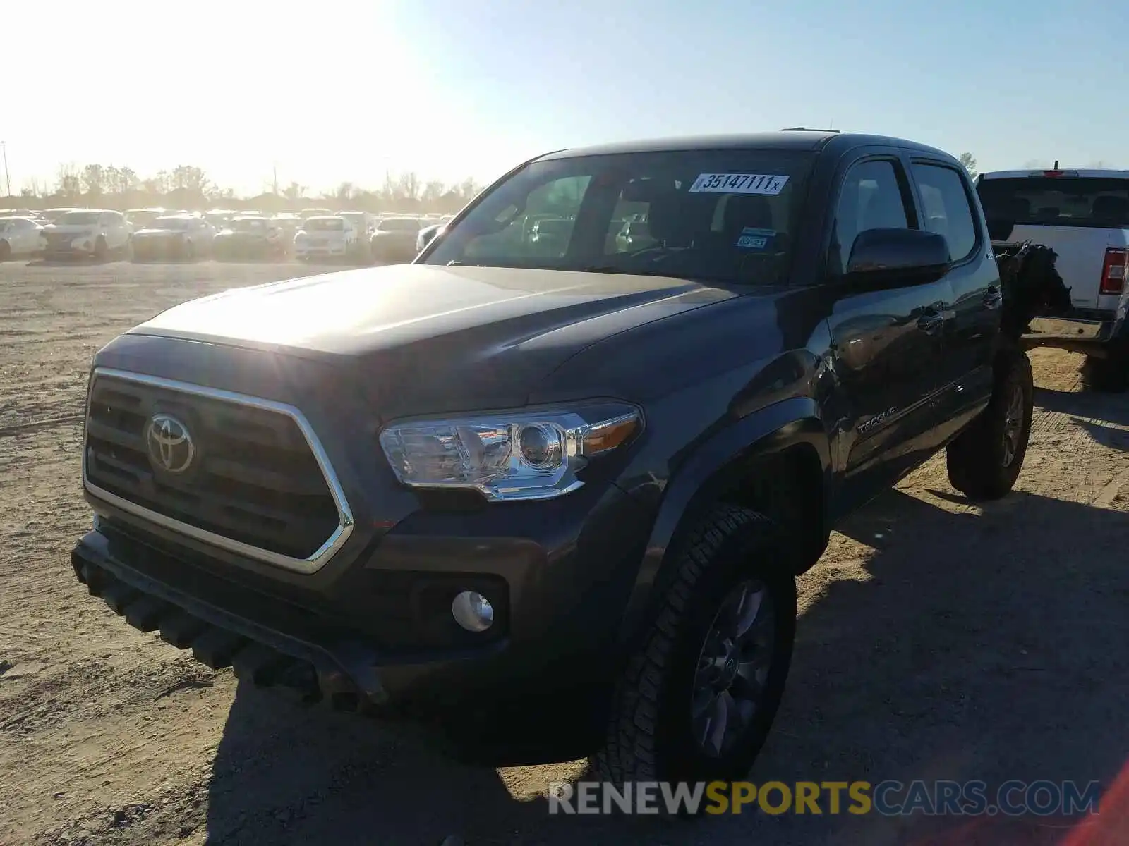 2 Photograph of a damaged car 5TFAZ5CN2KX074416 TOYOTA TACOMA 2019