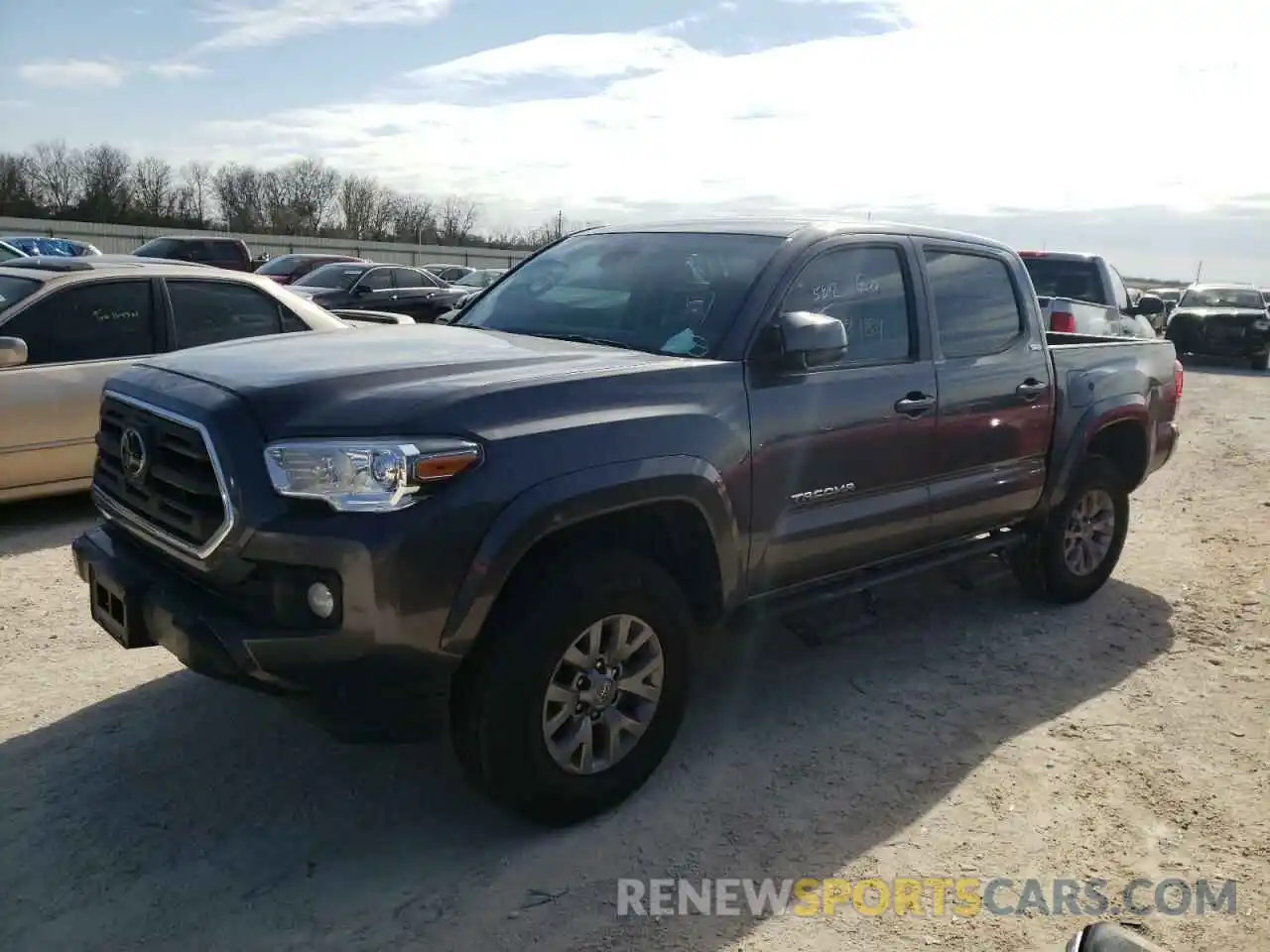 2 Photograph of a damaged car 5TFAZ5CN2KX074450 TOYOTA TACOMA 2019